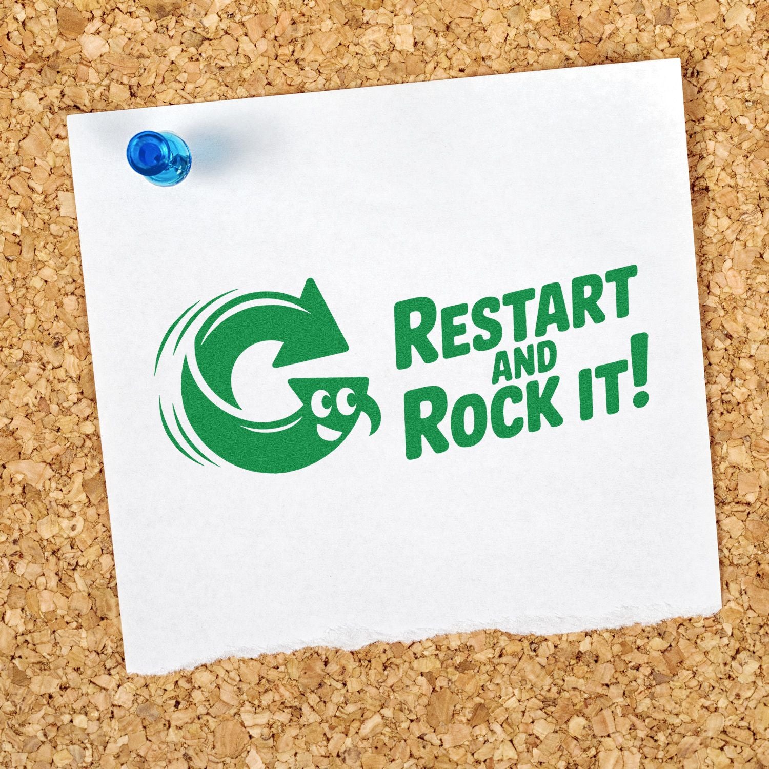Green stamp-and-seal product branding reading Restart and Rock It! on white paper pinned to corkboard with a blue pushpin.
