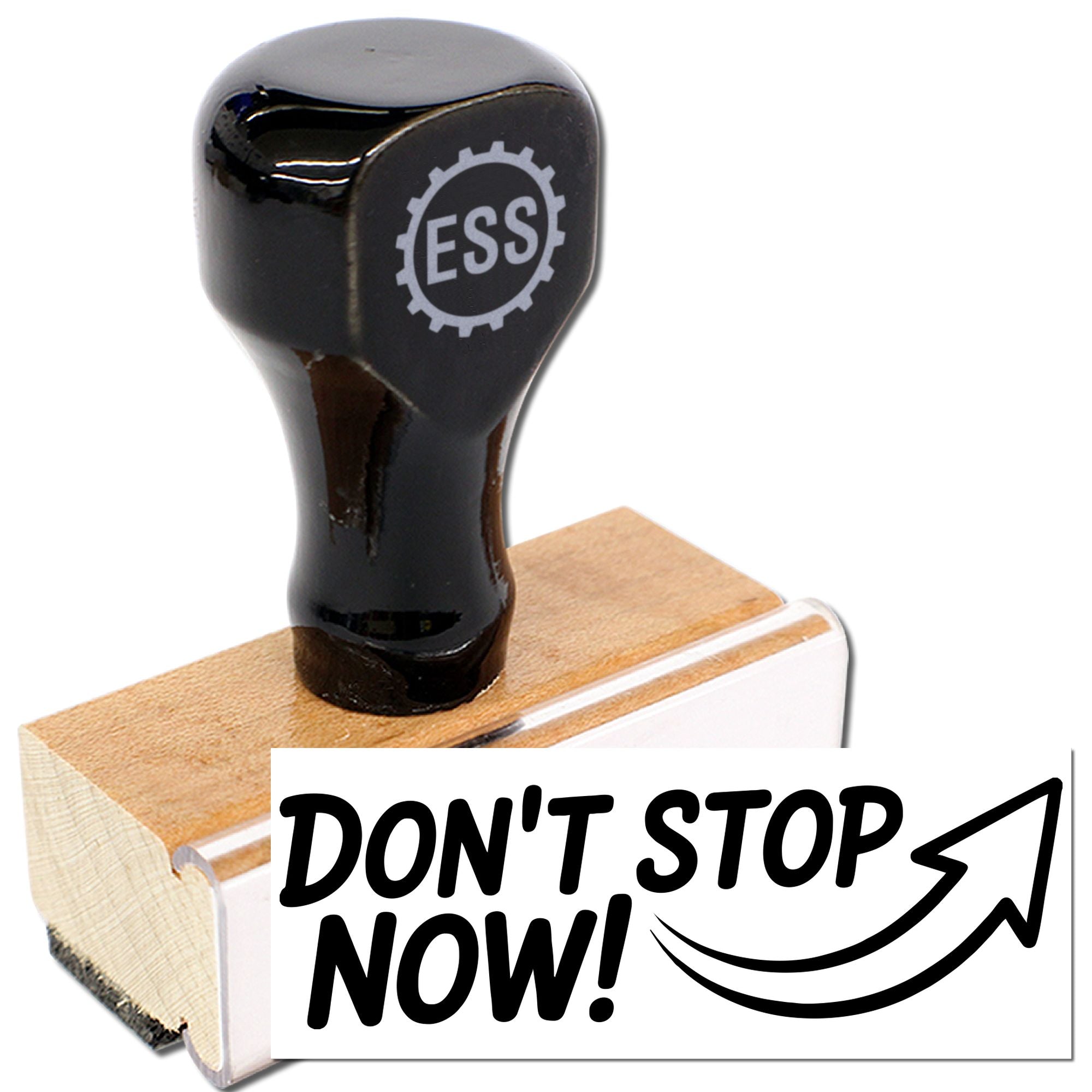Black ESS rubber stamp on wooden base with bold DONT STOP NOW! seal on white background