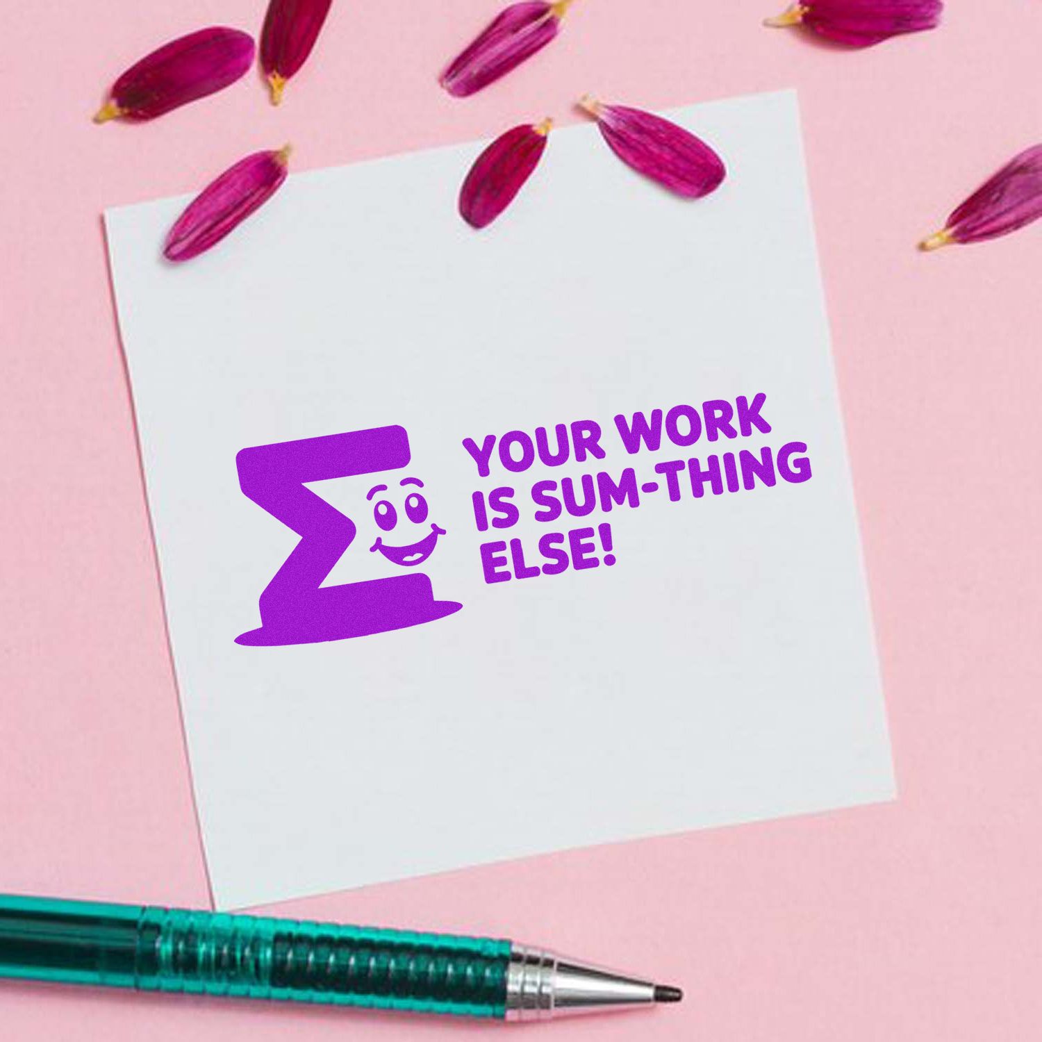 Purple novelty stamp and seal on white card with Your work is sum-thing else! pink petals and teal pen on pink background.