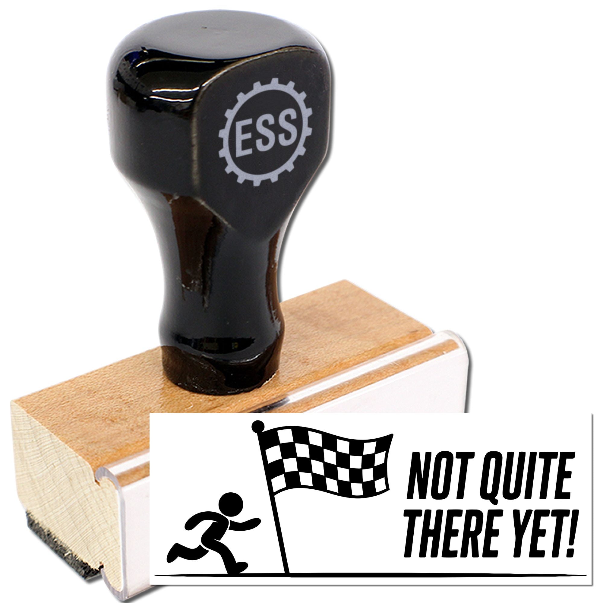 Black ESS rubber stamp and wooden seal block with Not Quite There Yet! runner graphic on white background.