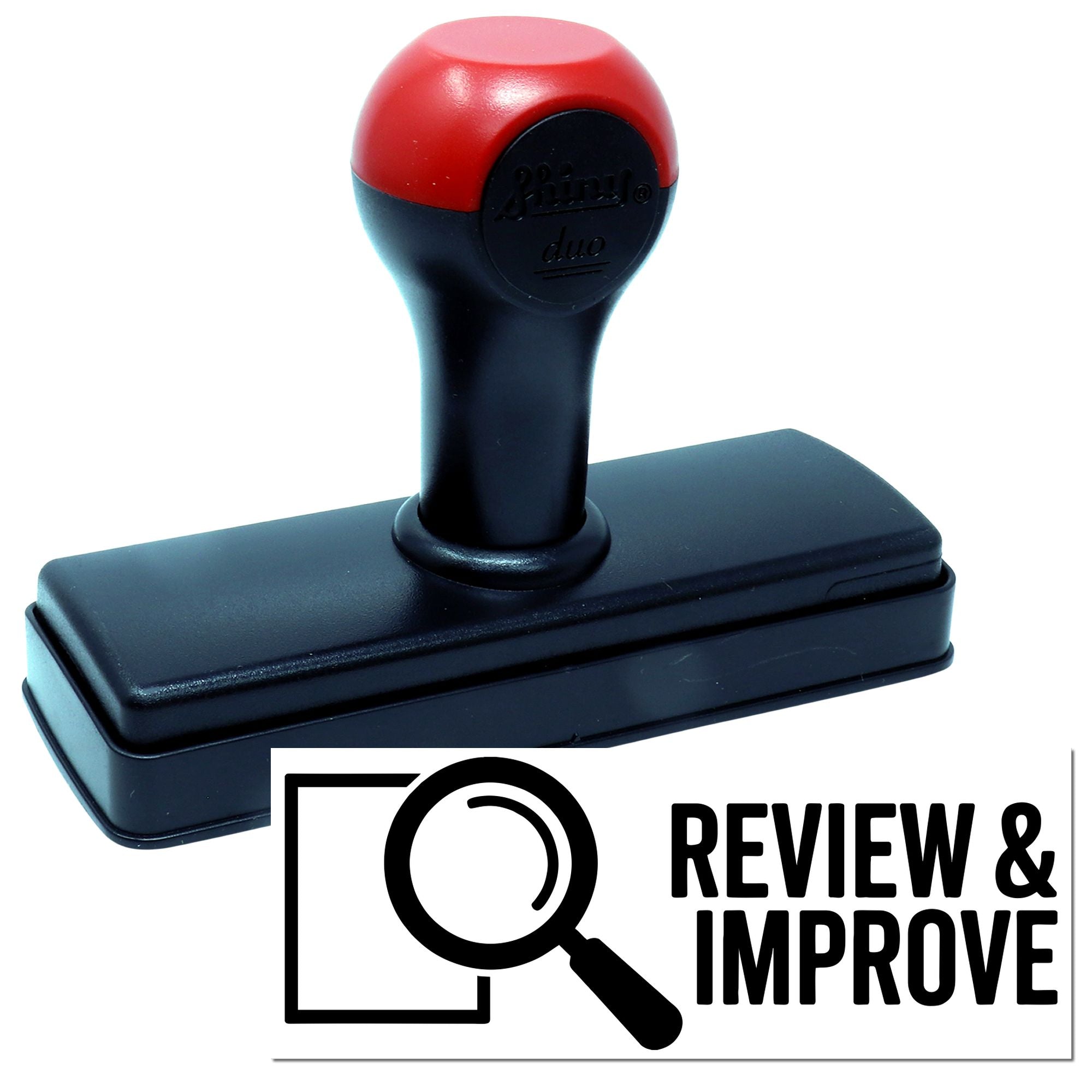 Red and black self-inking stamp seal with rectangular black base and Review & Improve branding.