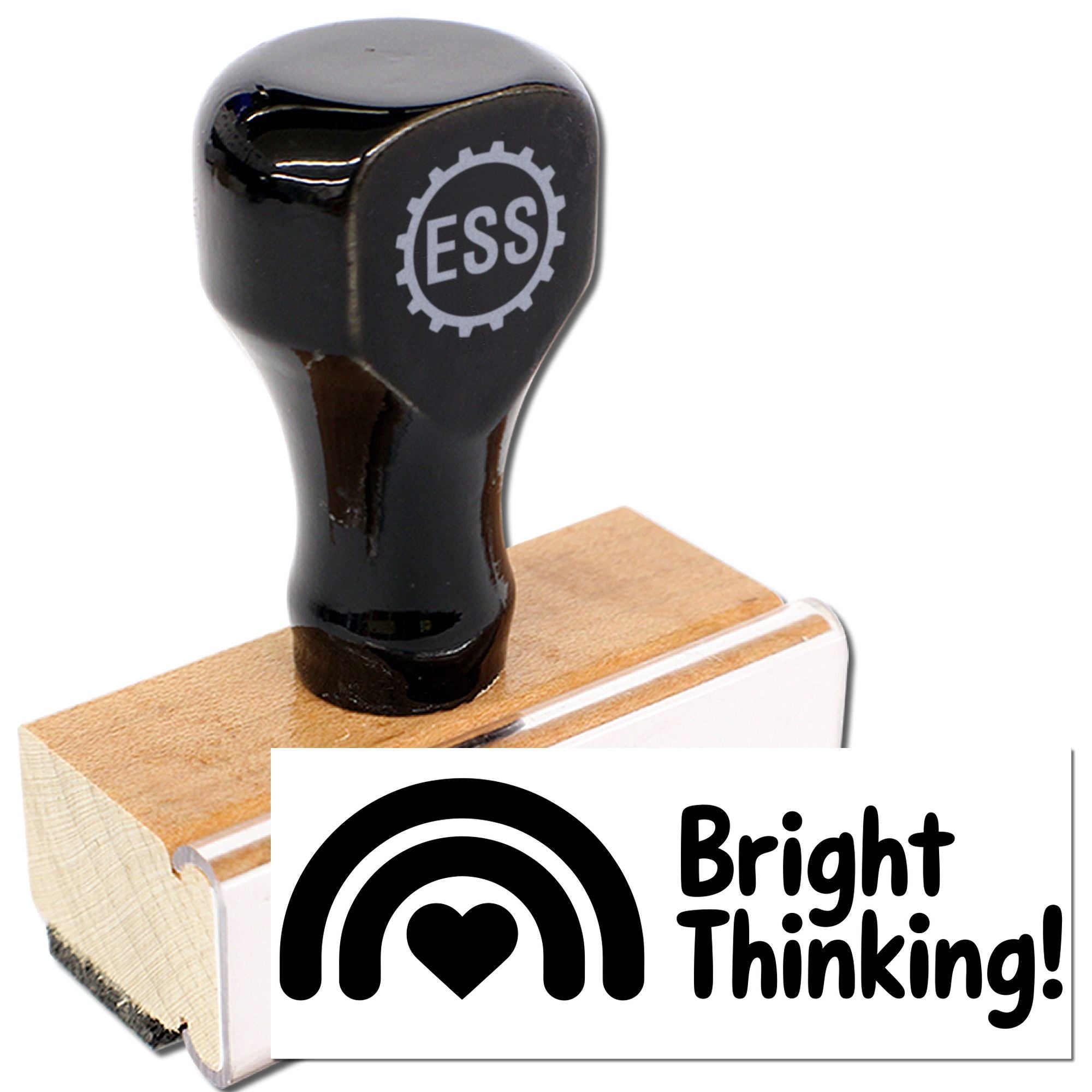 Black rubber stamp on wooden block with ESS logo, plus Bright Thinking! seal and black rainbow heart graphic.