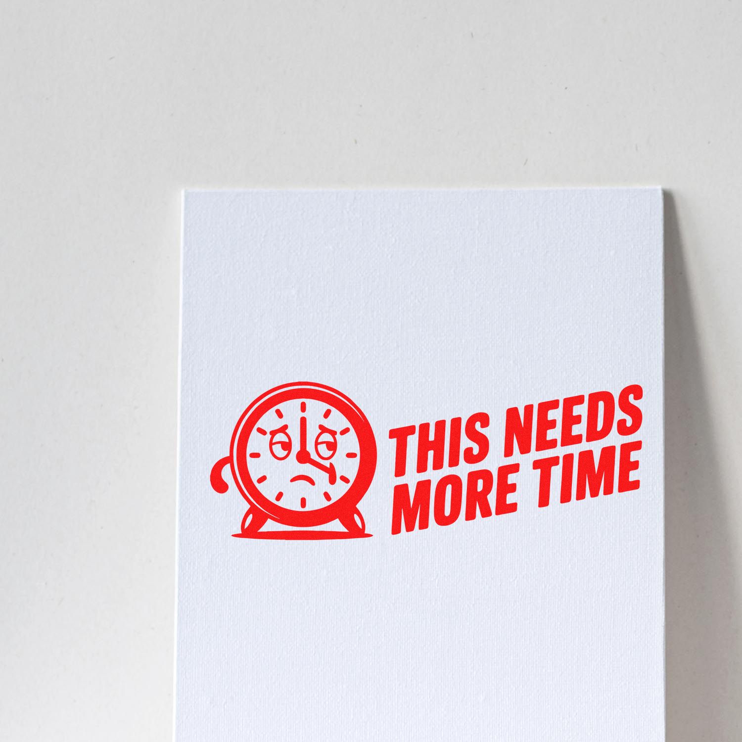 Red stamp seal on white card with a sad clock and text THIS NEEDS MORE TIME for stamp and seal products.