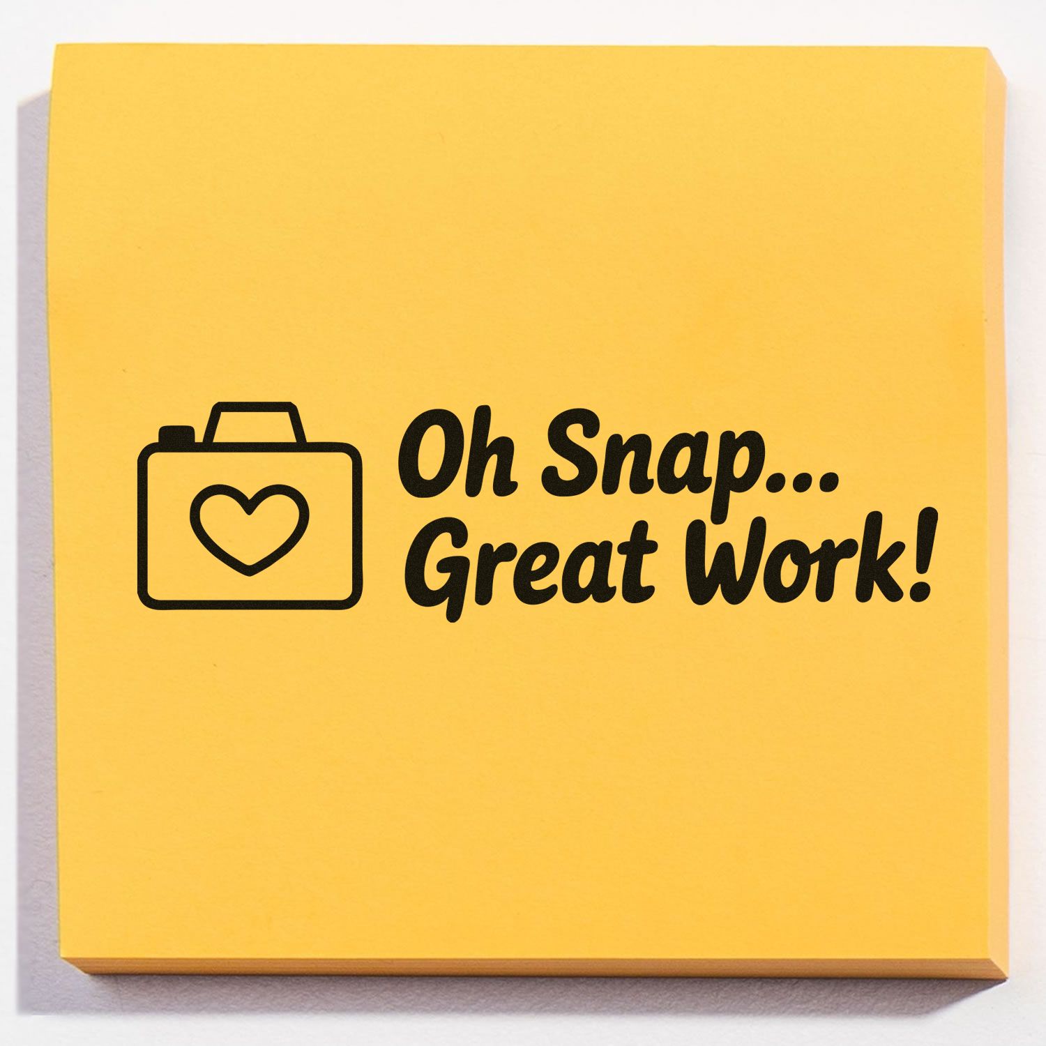 Yellow self-inking stamp and seal with black suitcase heart icon and Oh Snap... Great Work! message.