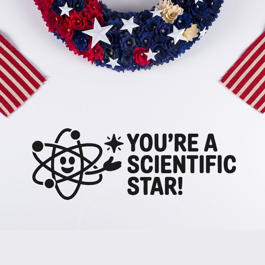 Black science stamp and seal reading Youre a Scientific Star! with atom icon and red, white, blue patriotic accents.