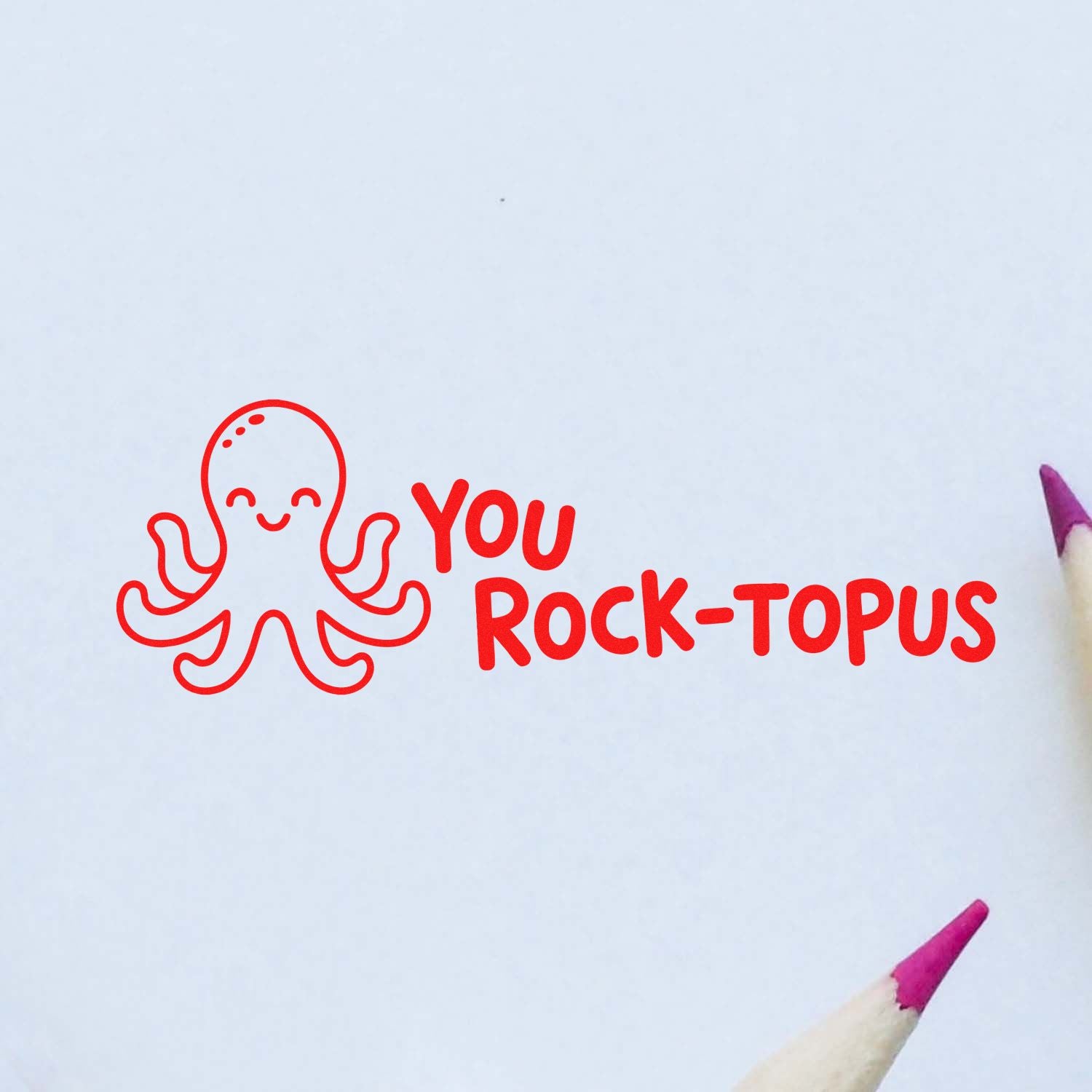 Trodat Cute Your Work Is Magnetic self-inking teacher stamp in use, featuring a magnetic stock design for educational purposes