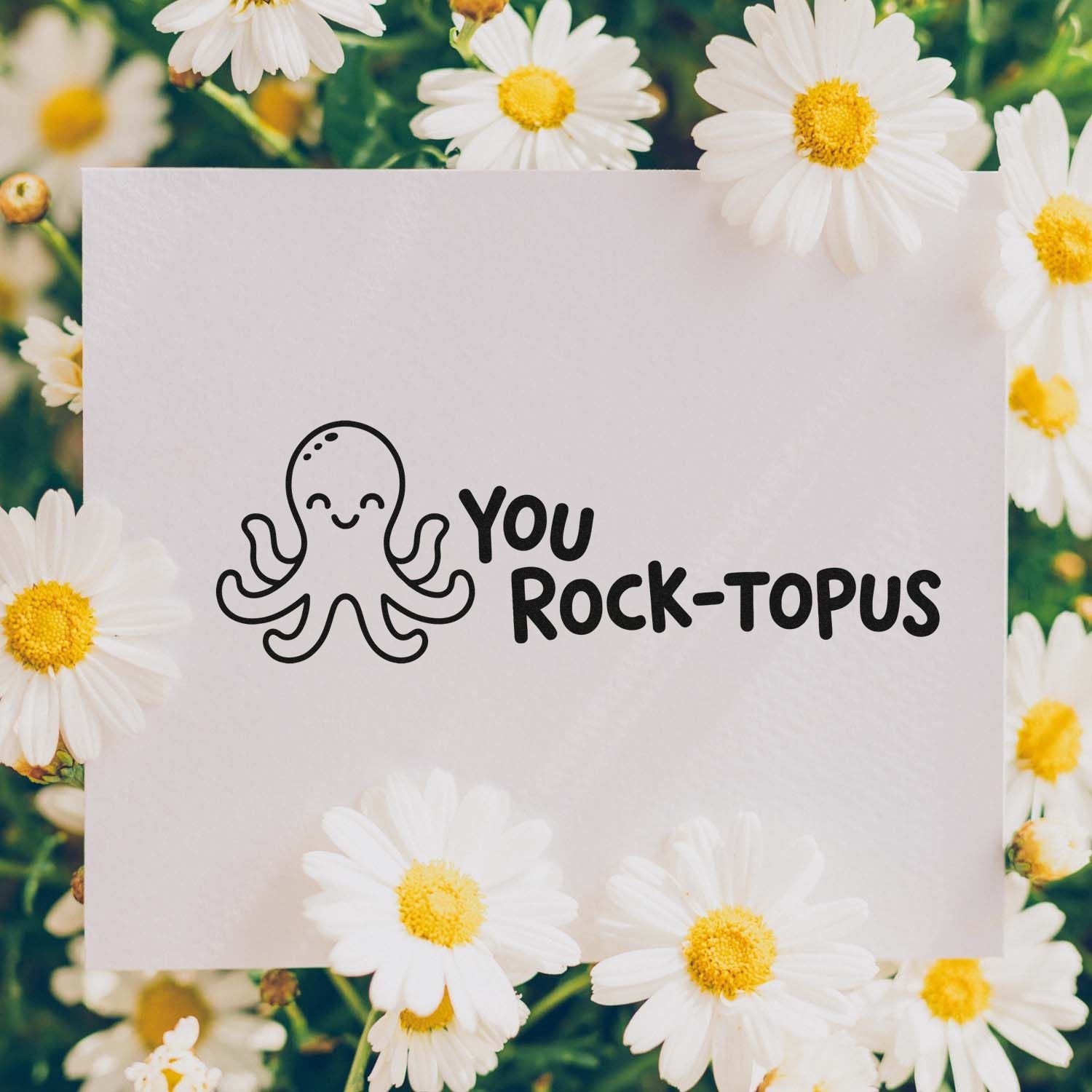Custom stamp and seal with black octopus and You Rock-topus on white card, framed by white daisies with yellow centers.