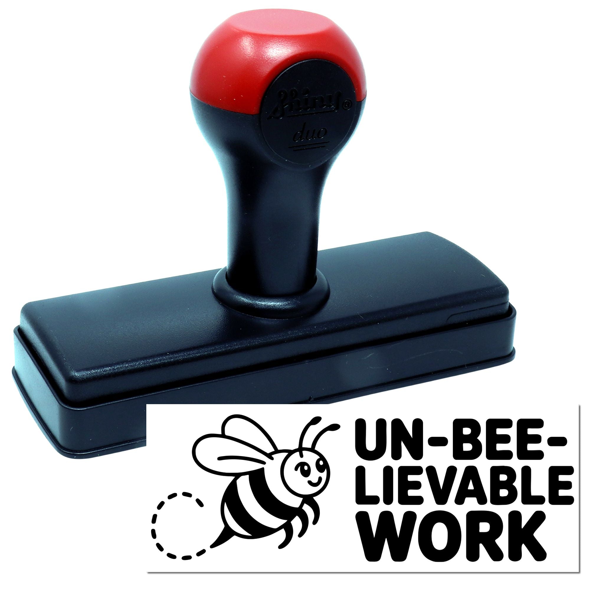 Red and black self-inking stamp and seal with bee logo and UN-BEE-LIEVABLE WORK text on white background.