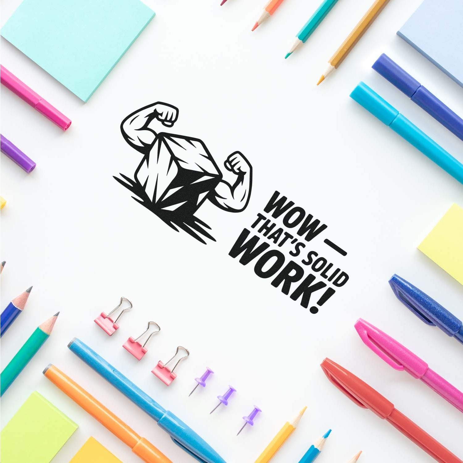 Black custom stamp and seal design with flexing arm and Wow, thats solid work! text, framed by colorful pens and notes.