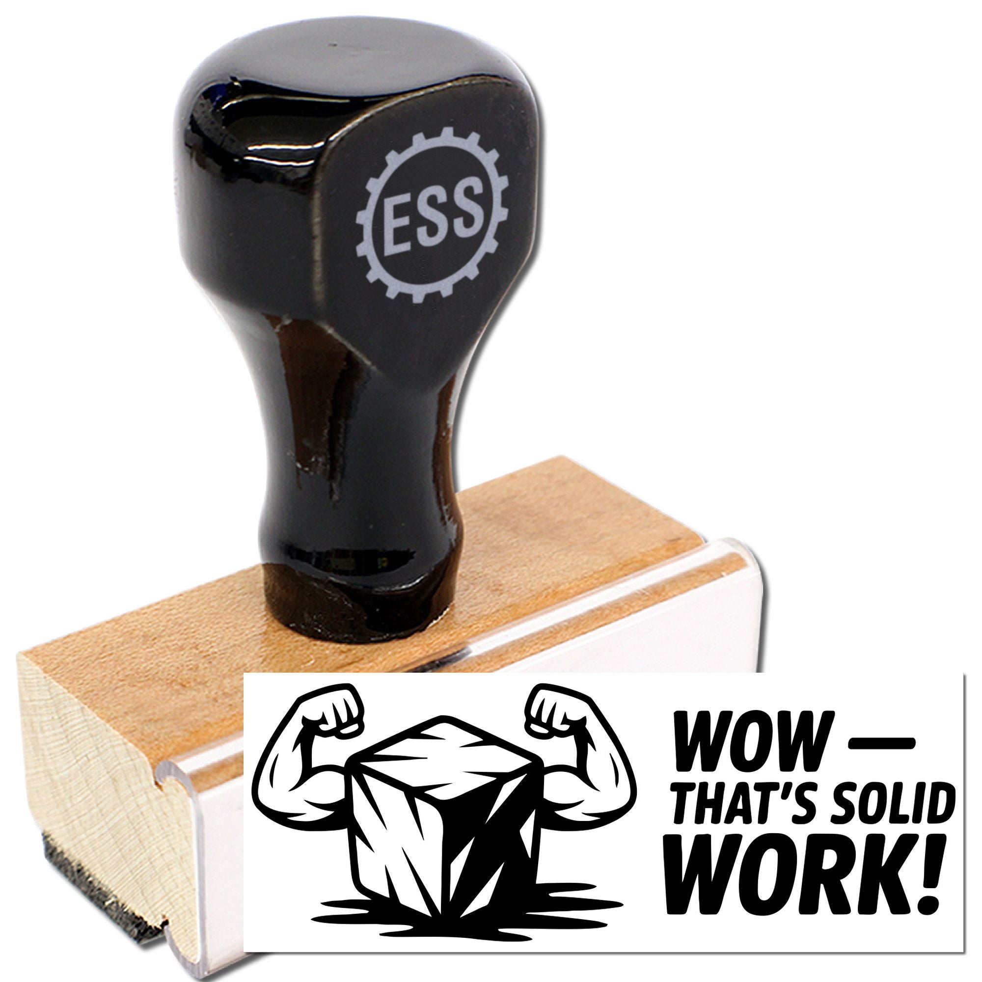 Black rubber stamp seal on wooden block with gray ESS logo, showing a bold WOWTHATS SOLID WORK! imprint.