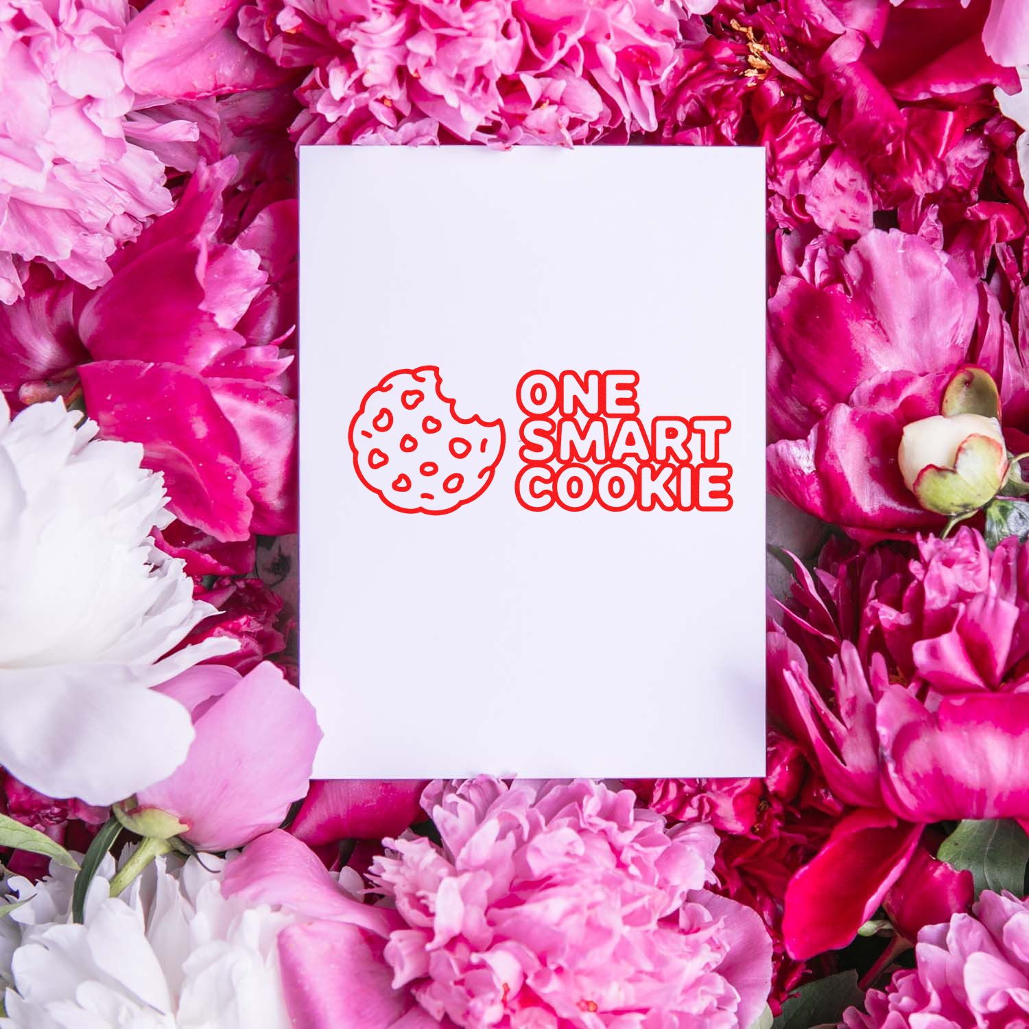 White stamp card featuring a red One Smart Cookie cookie seal logo, surrounded by pink and white flowers.