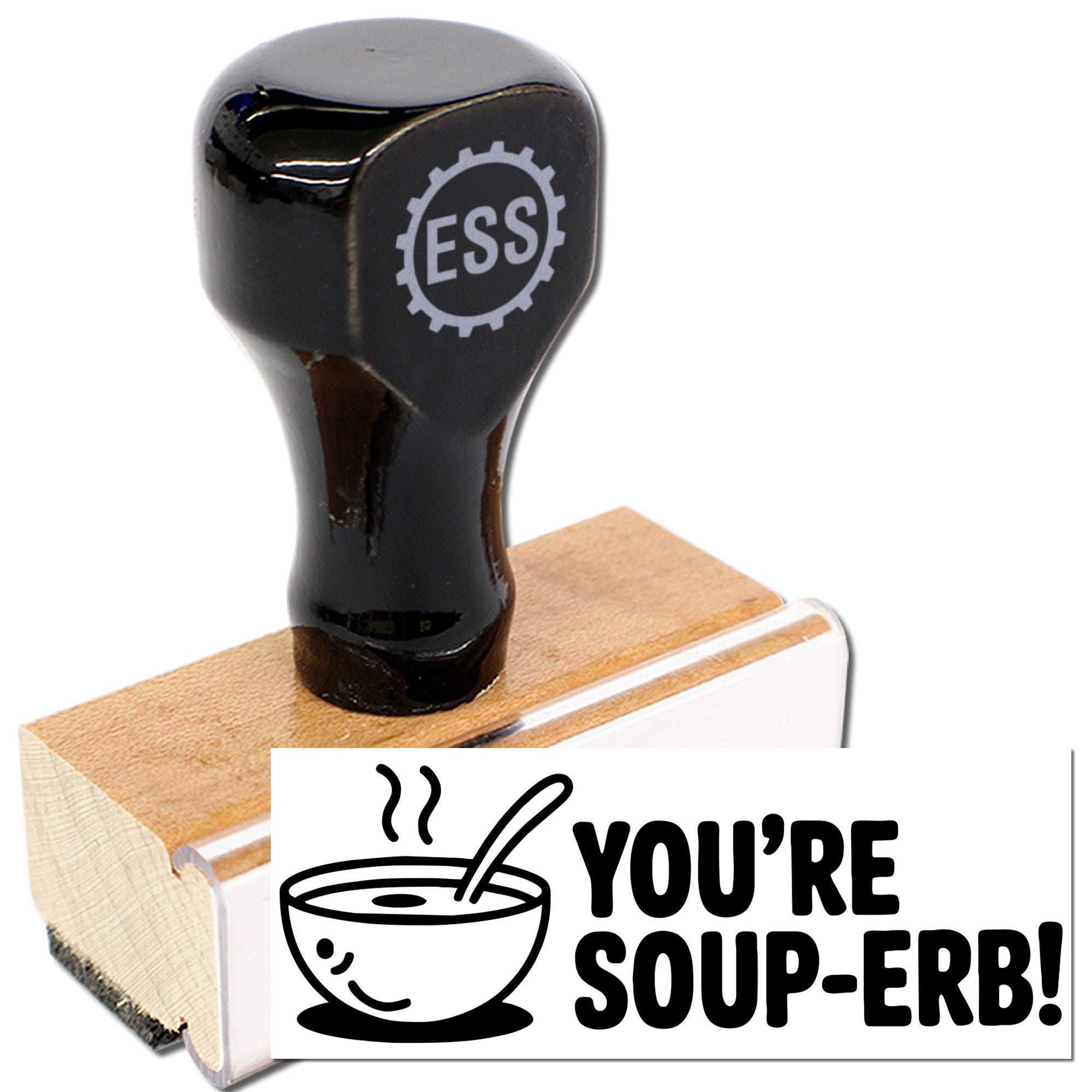 Black rubber stamp seal with wooden base, featuring a white YOURE SOUP-ER! design and soup bowl icon.