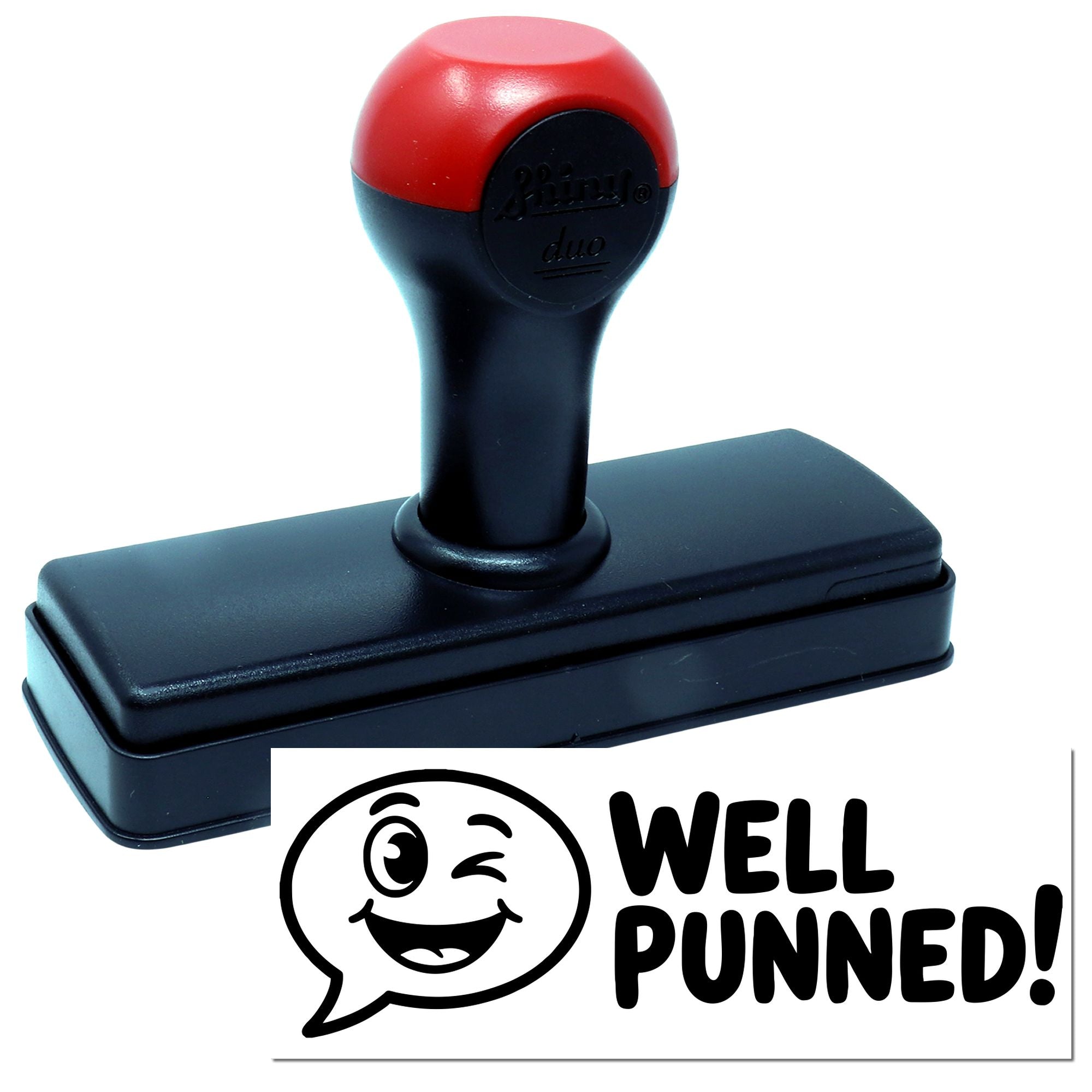 Red-and-black self-inking rubber stamp with smiling Well Punned! seal design on a white background.