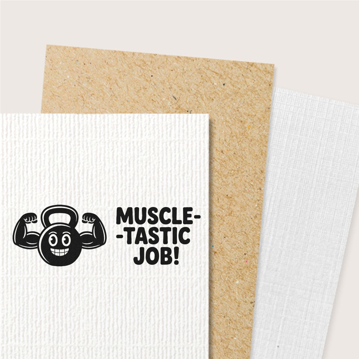 Black custom stamp seal with flexing kettlebell and Muscle-tastic Job! on white textured card, kraft brown backing.