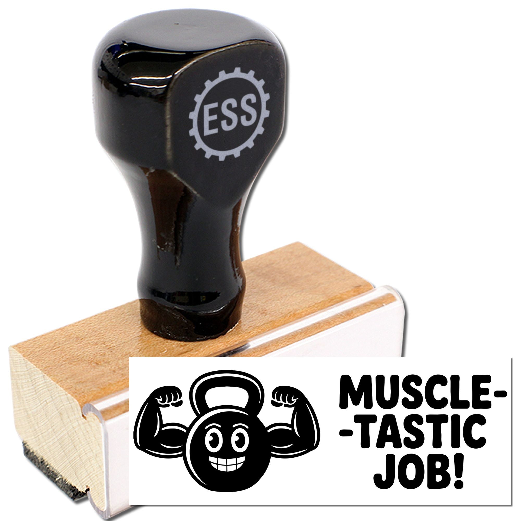 Black ESS stamp on wood base with muscle-themed seal reading MUSCLE-TASTIC JOB! and flexing kettlebell graphic