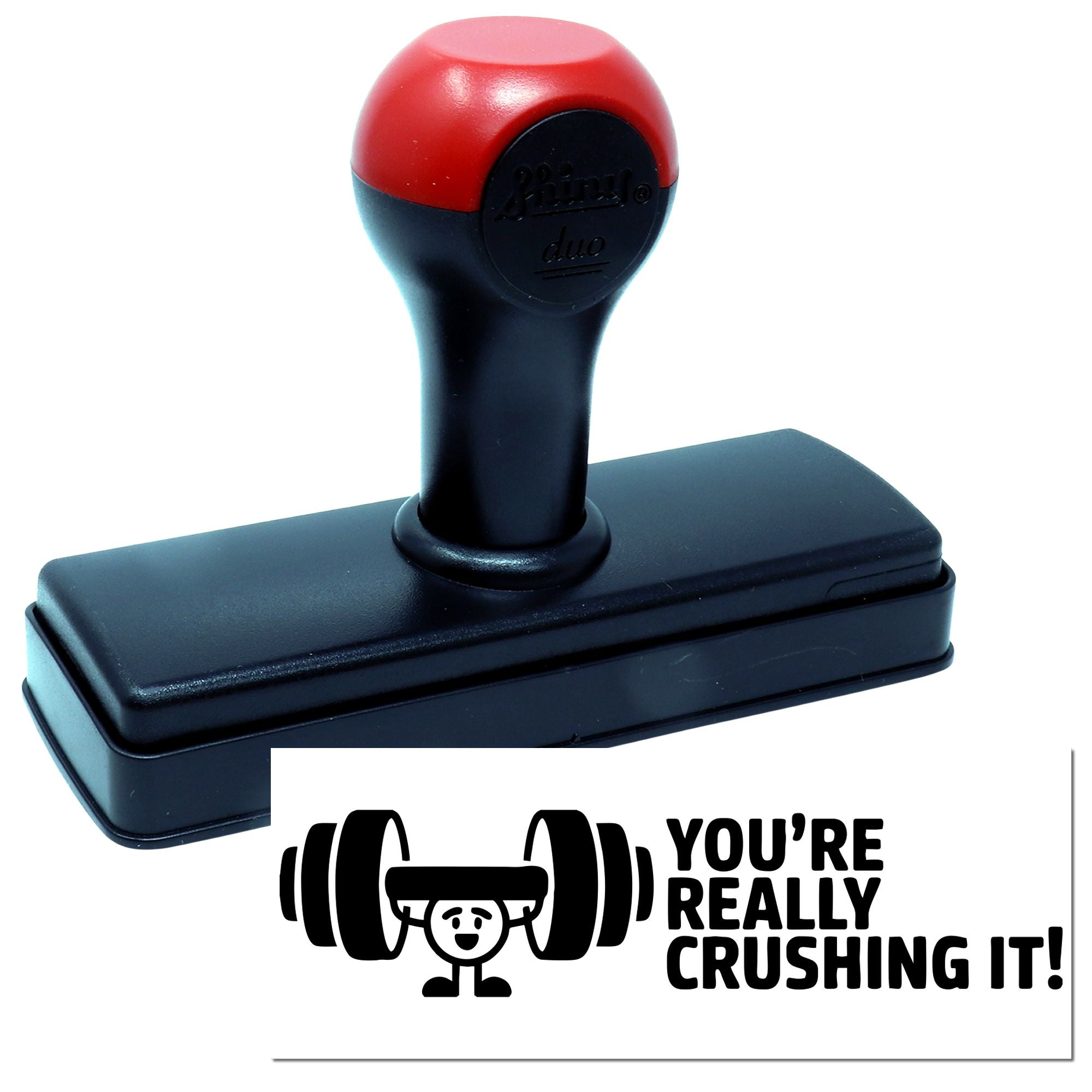 Red and black self-inking stamp with seal reading Youre really crushing it! and weightlifter graphic.