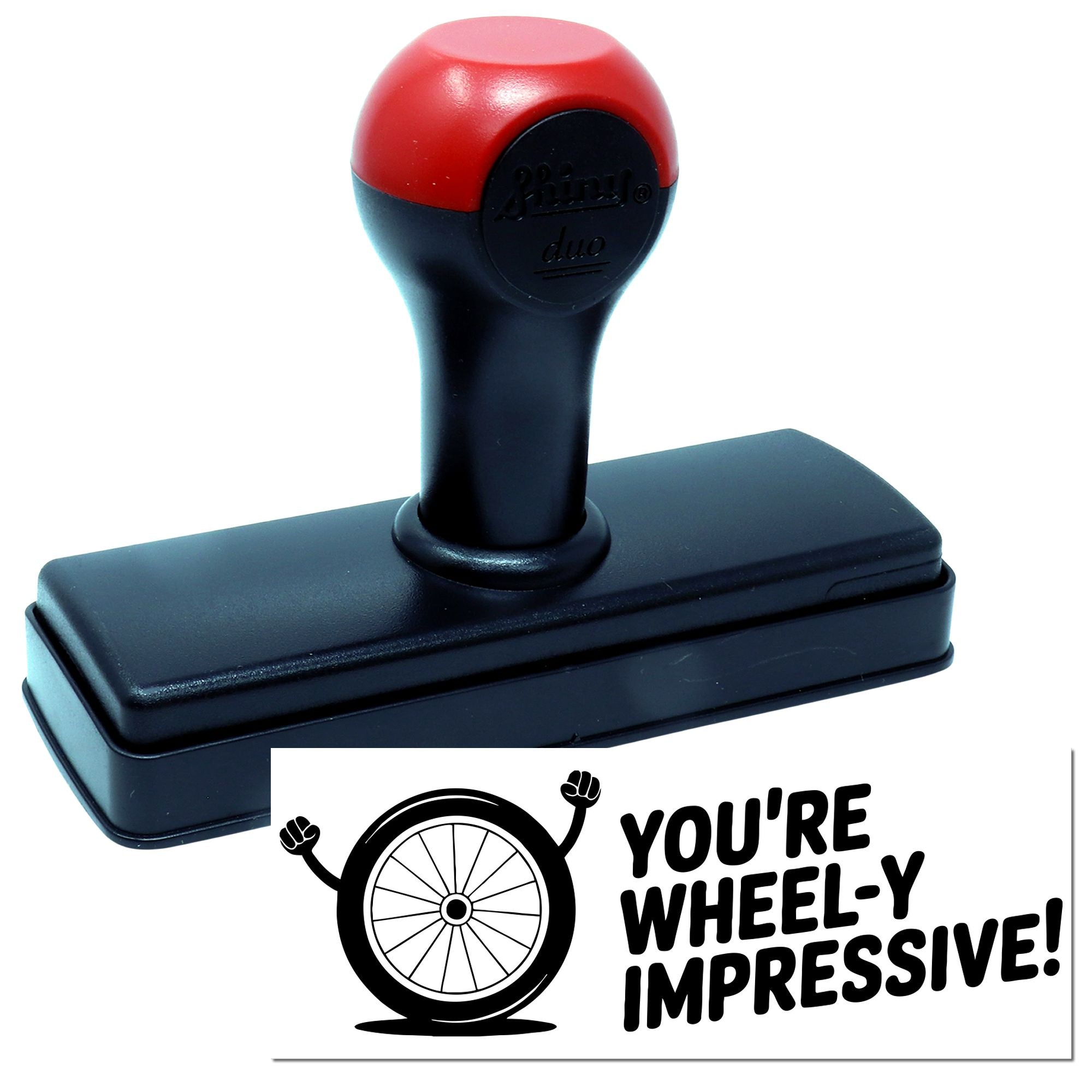 Red and black self-inking stamp and seal with wheel-themed imprint reading Youre wheel-y impressive!