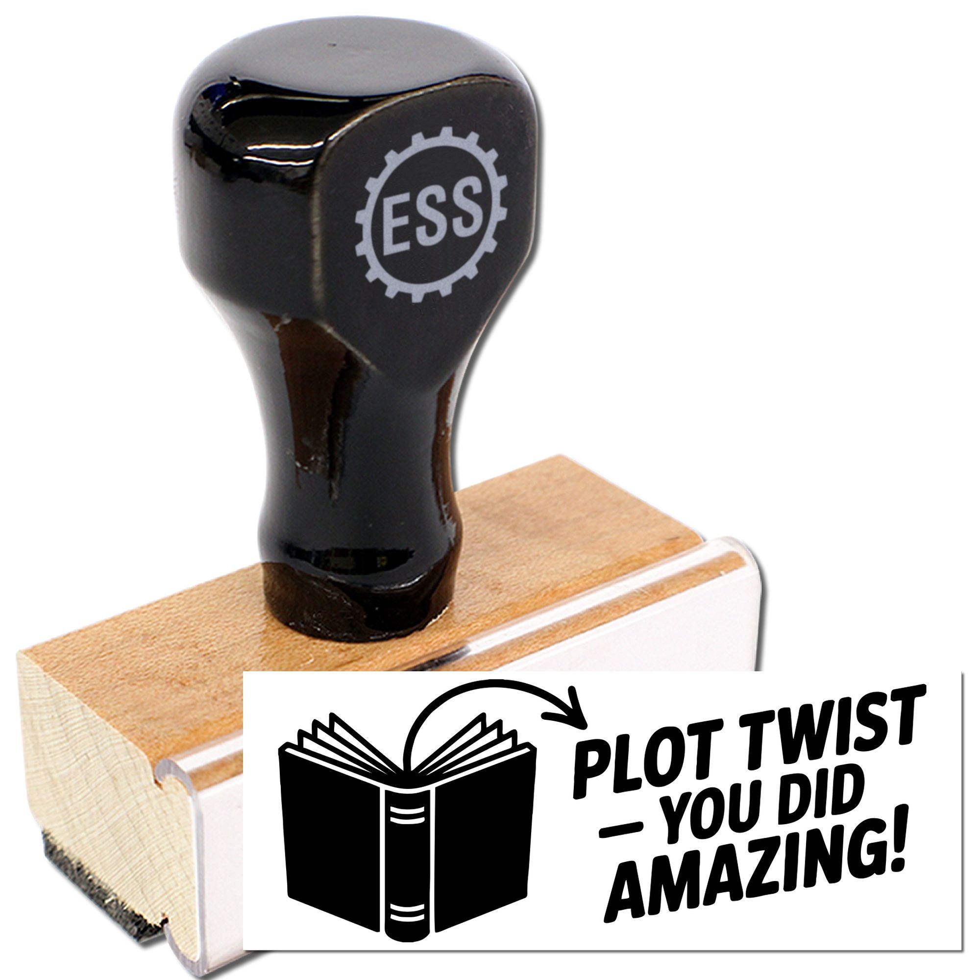 Black self-inking stamp on a wooden base with ESS gear logo and a white seal reading Plot twist you did amazing!