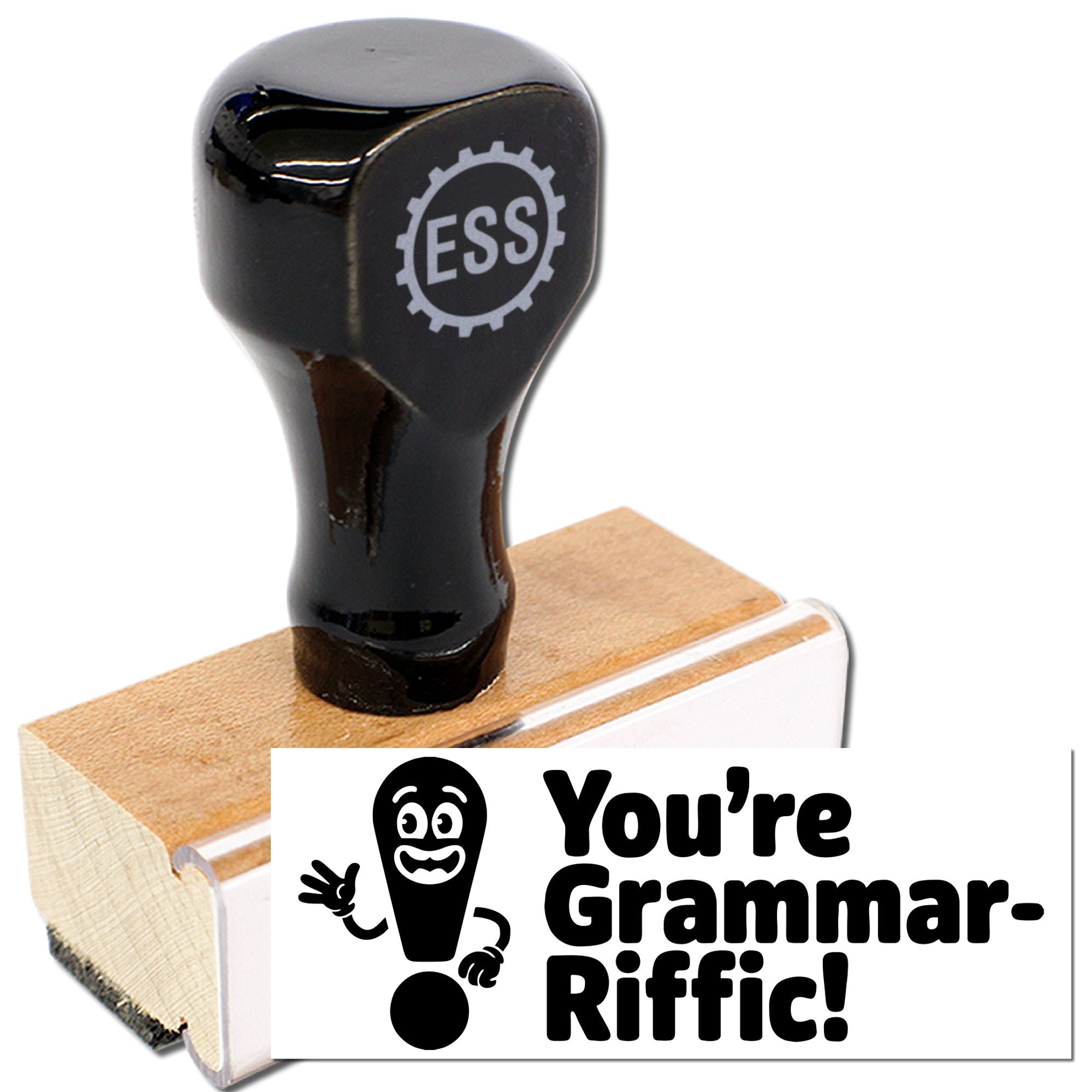 Black rubber stamp seal on wood with ESS logo and bold Youre Grammar-Riffic! imprint.