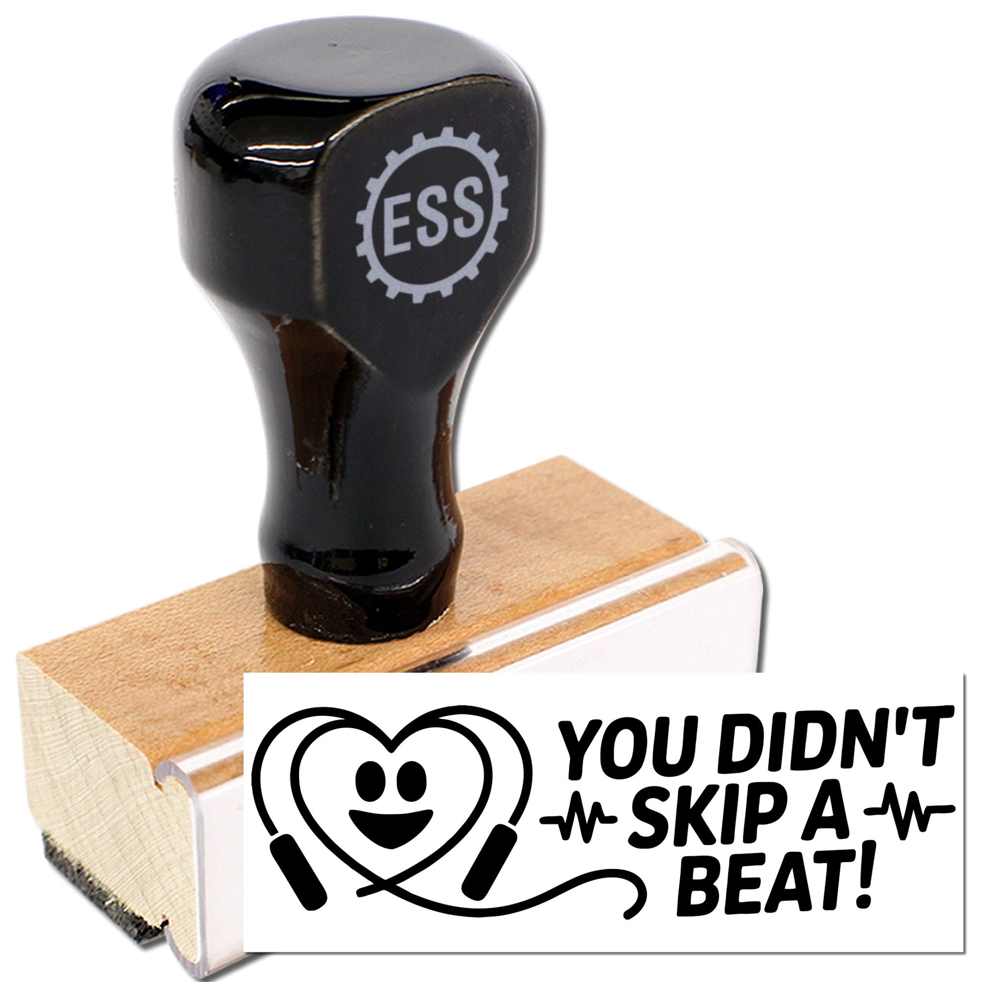 Black ESS rubber stamp and wooden seal with heart-headphone design and You Didnt Skip a Beat! text.