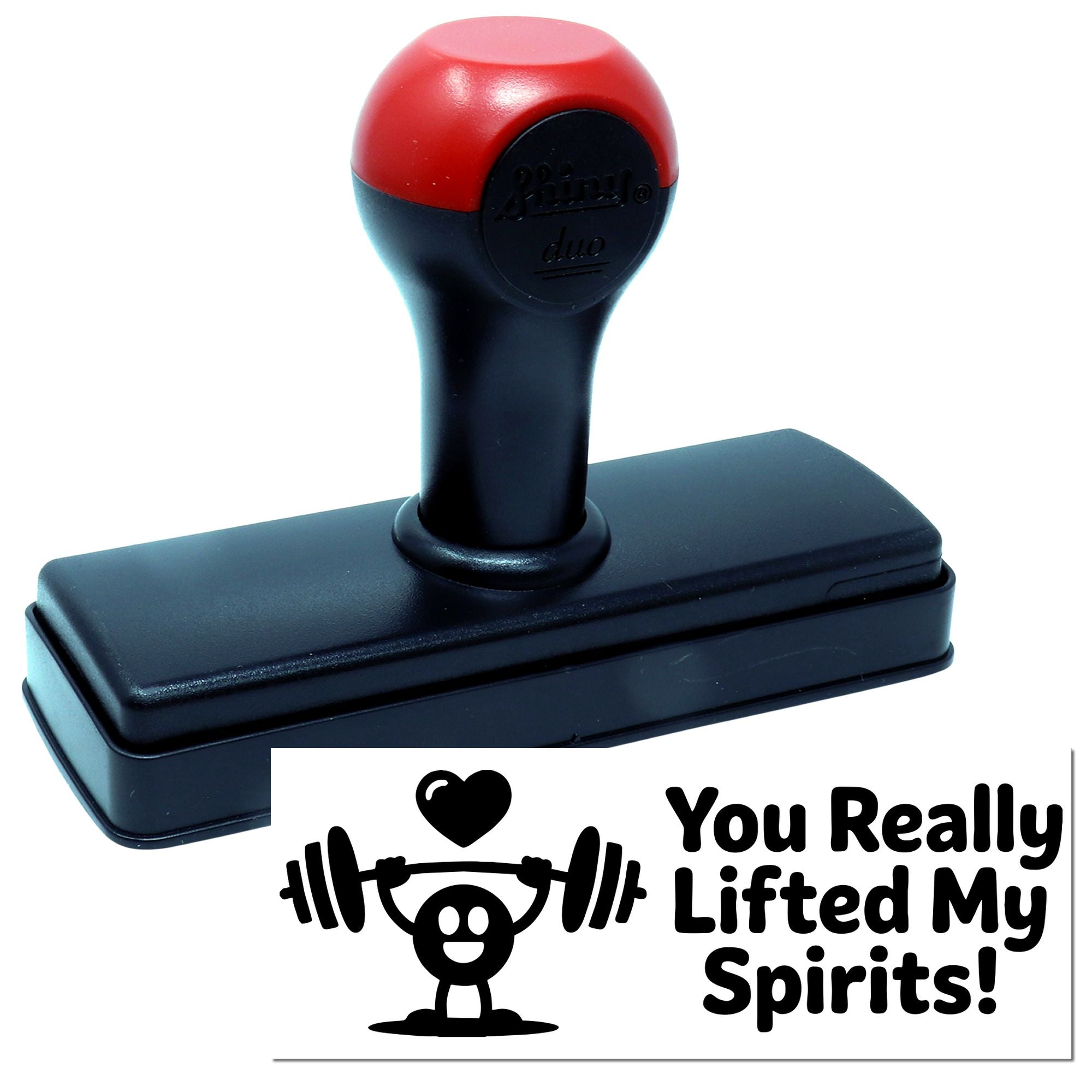 Red and black self-inking stamp with a rubber seal reading You Really Lifted My Spirits!