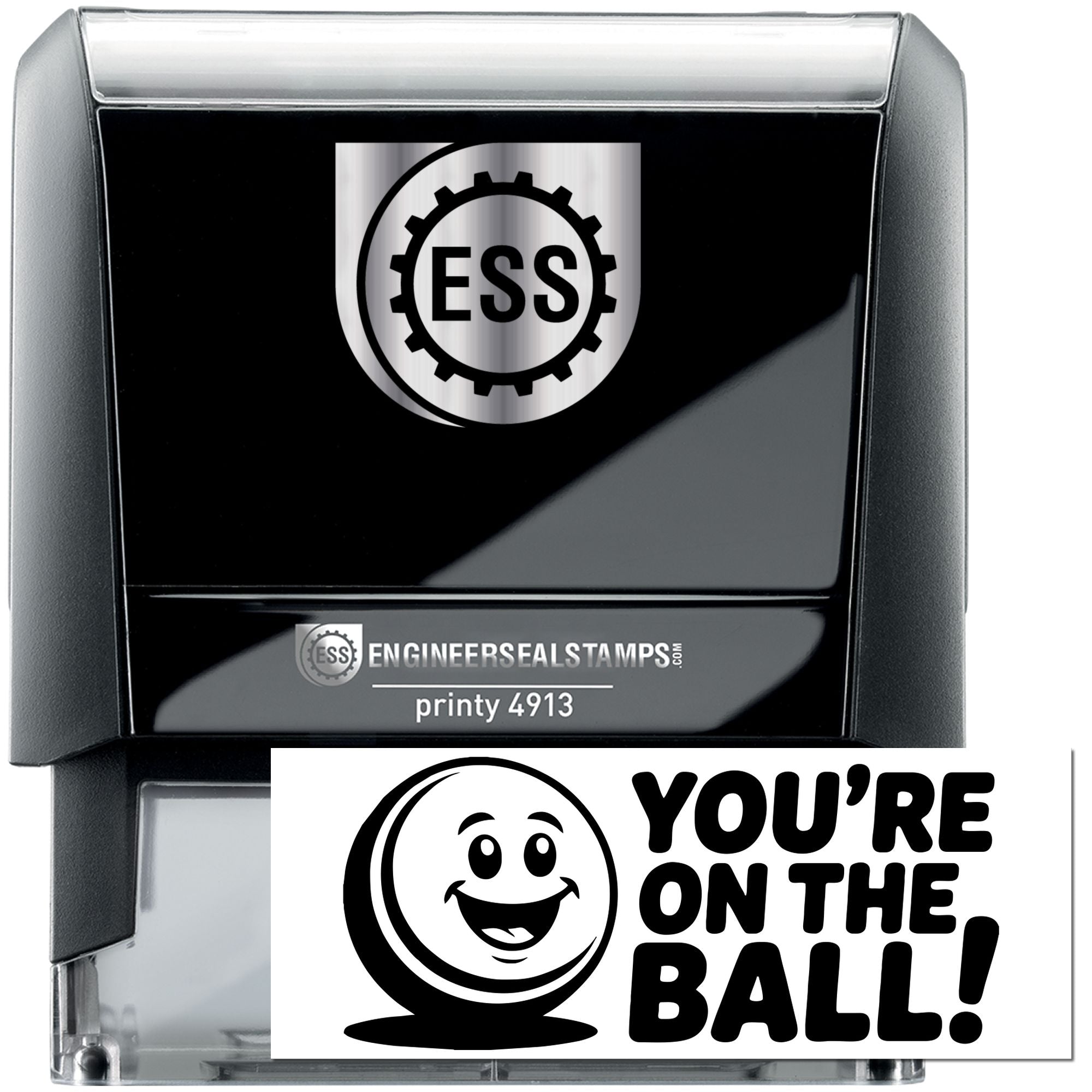 Black self-inking ESS engineer seal stamp with silver accents and Youre on the ball! graphic.