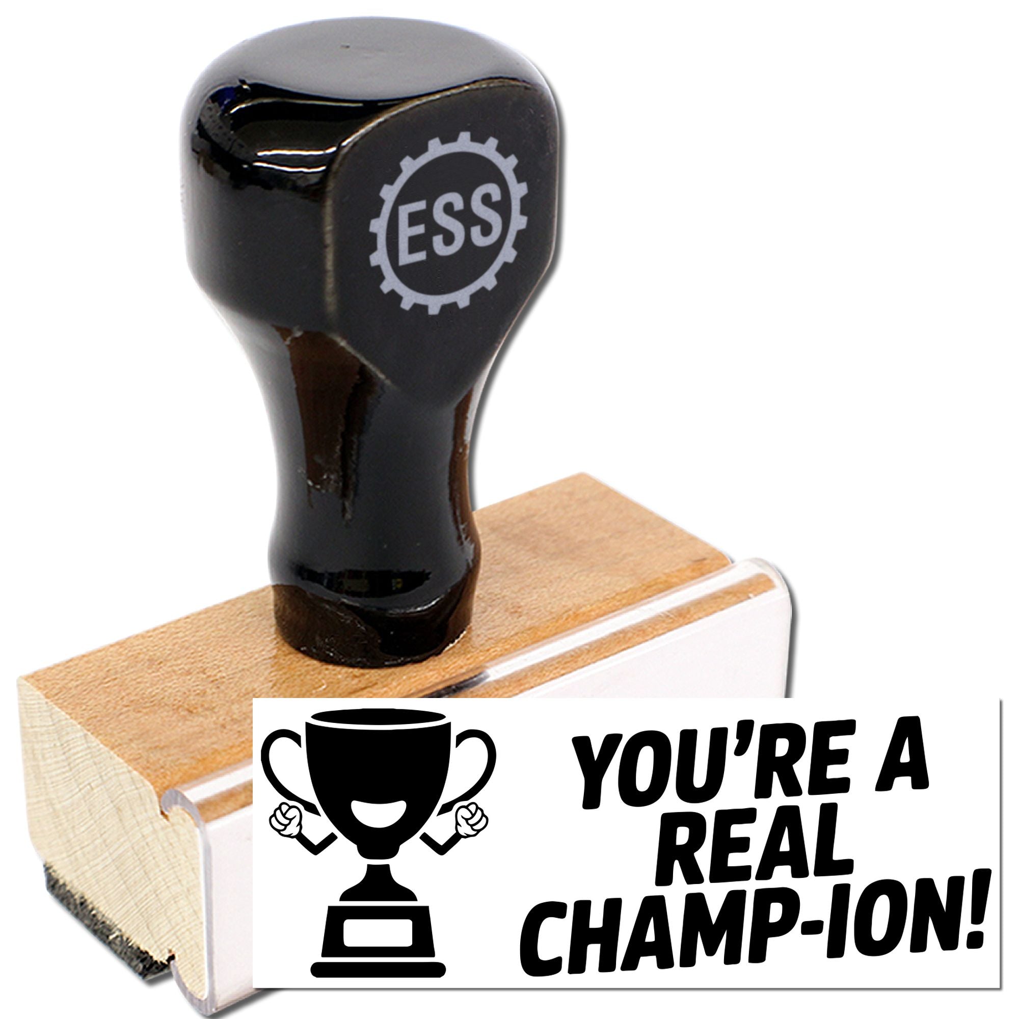 Black ESS self-inking stamp on wooden base with trophy seal reading YOURE A REAL CHAMP-ION!
