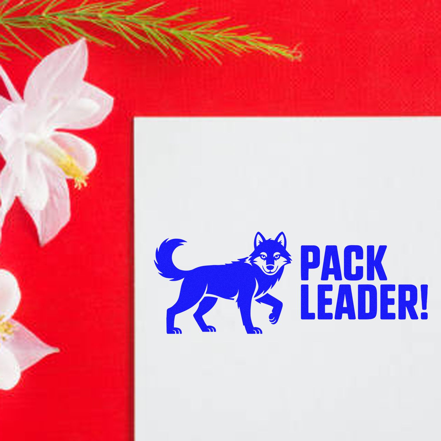 Red floral backdrop with a white card showing a blue wolf PACK LEADER! stamp seal design.