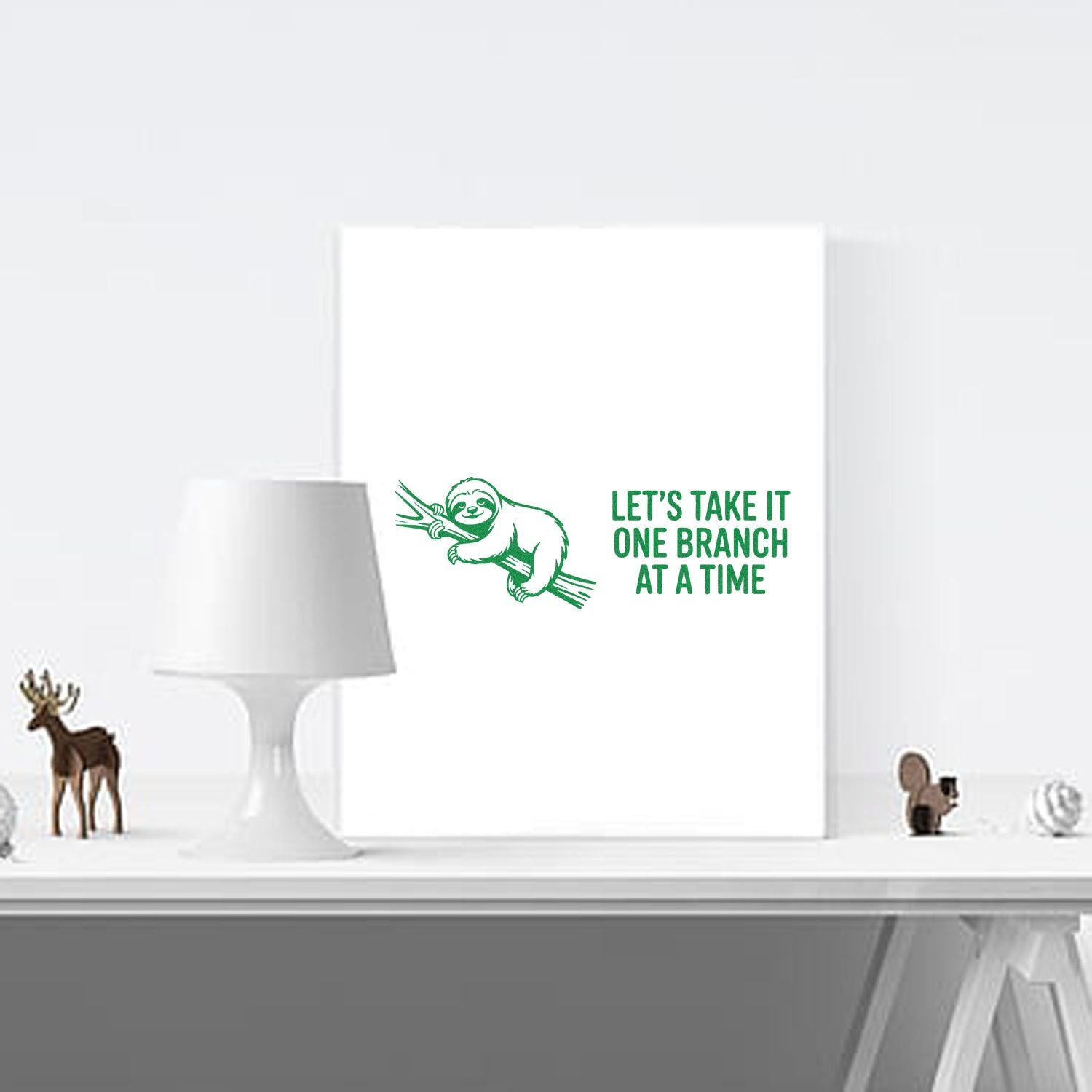 Green sloth seal stamp design with Lets take it one branch at a time text on a white background.