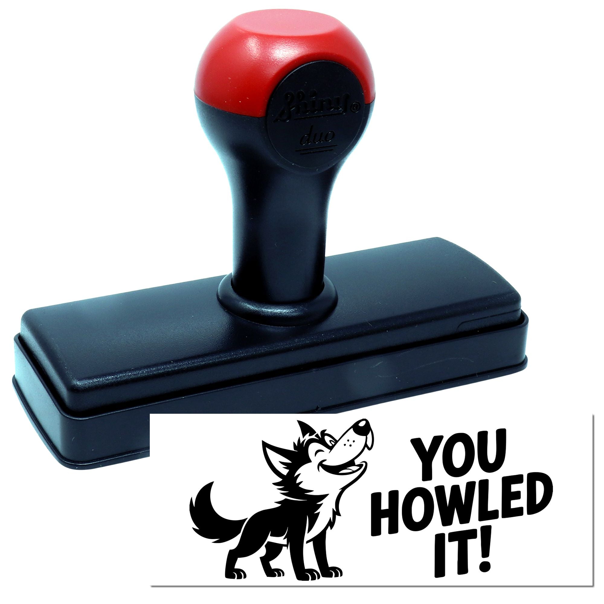 Red and black self-inking stamp and seal with wolf graphic and YOU HOWLED IT! on white.