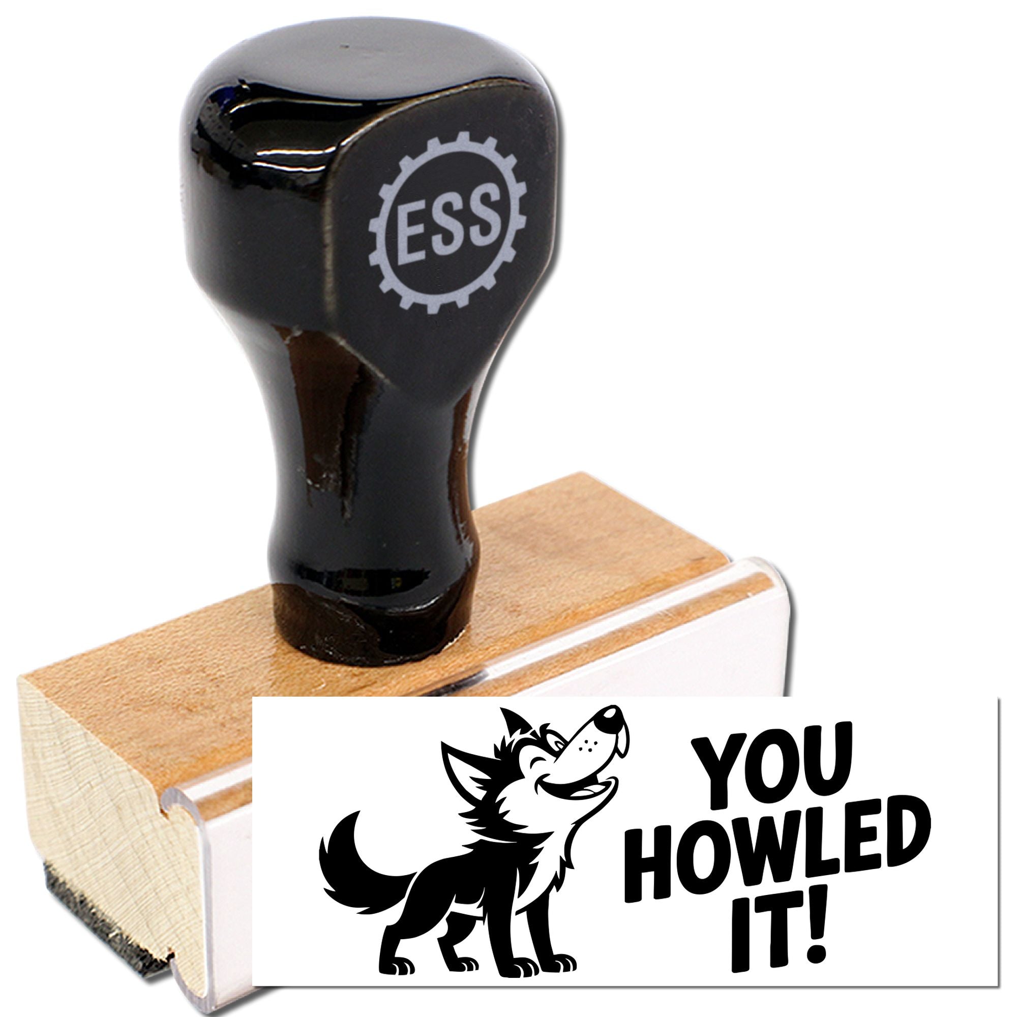 Black rubber stamp with wooden base, ESS logo, and white seal print reading YOU HOWLED IT! with dog graphic.