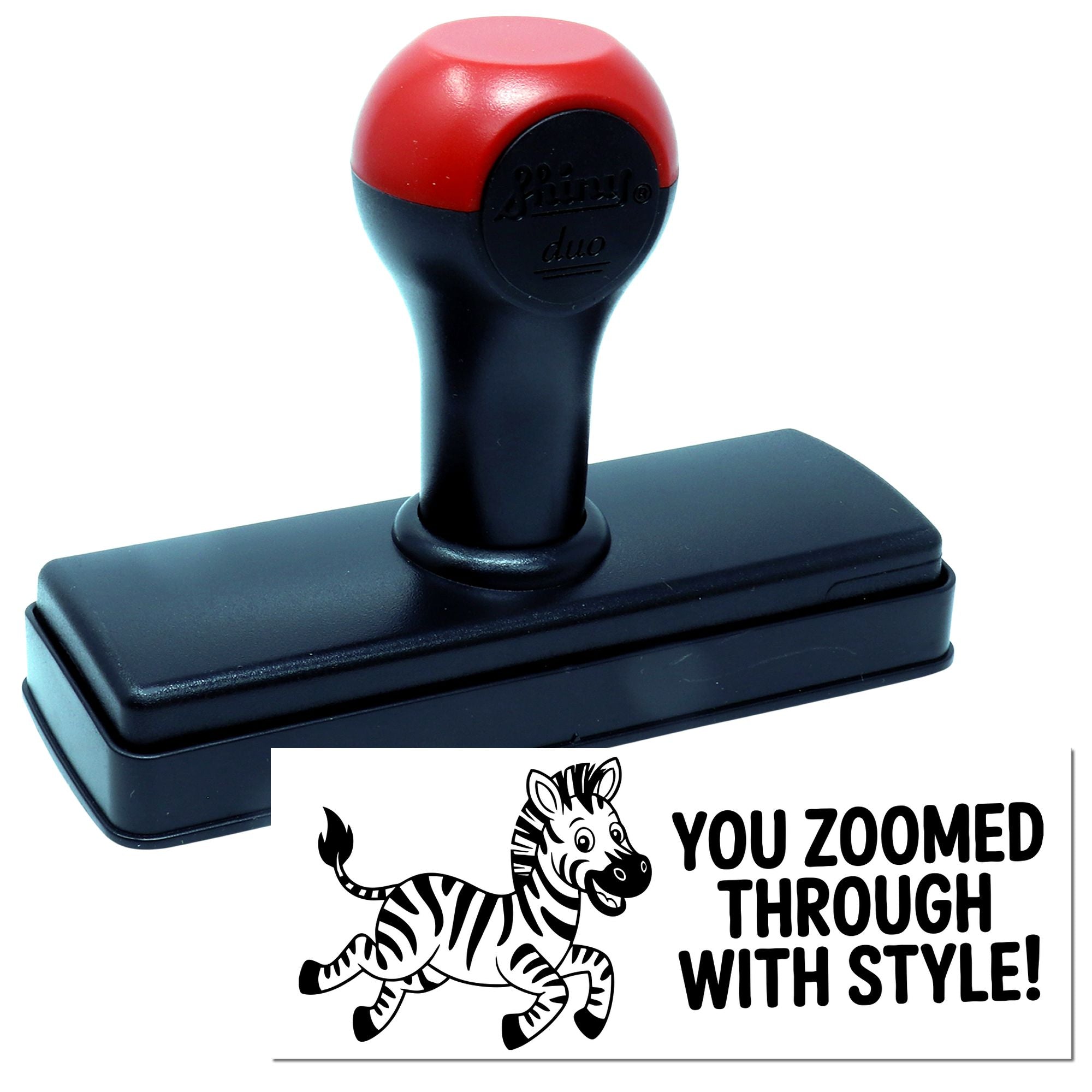 Black self-inking stamp with red cap and zebra seal reading You zoomed through with style!