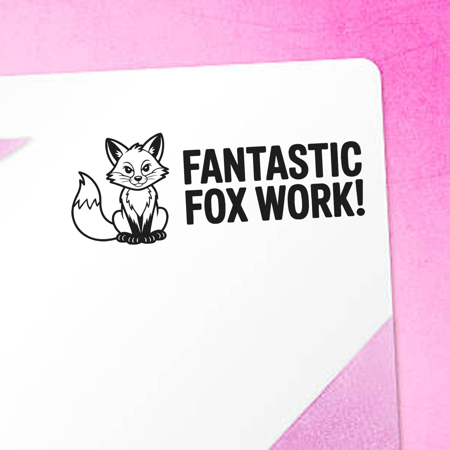Black fox stamp seal with Fantastic Fox Work! on a white card against a pink background.