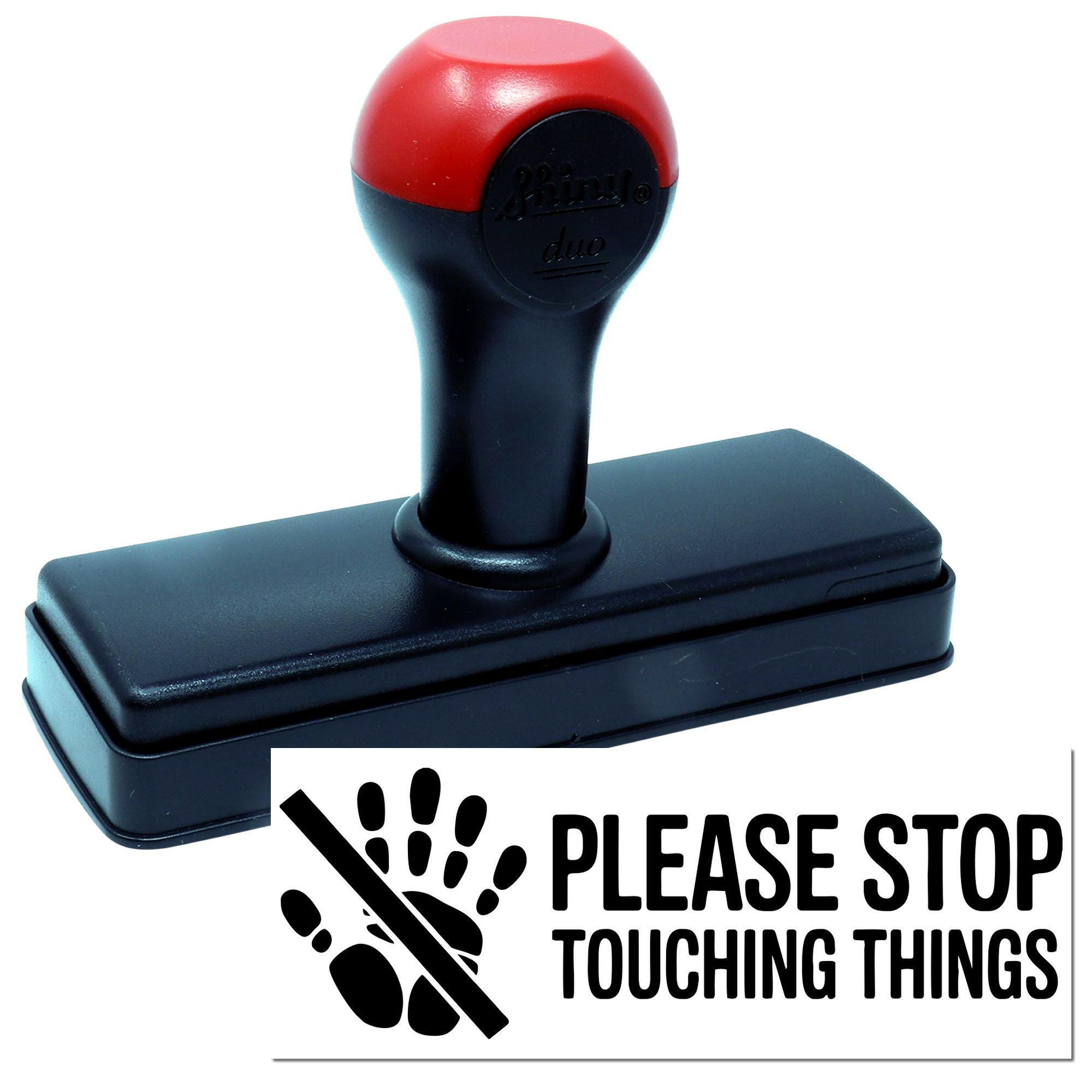 Red and black self-inking stamp with rectangular base and Please Stop Touching Things seal design.