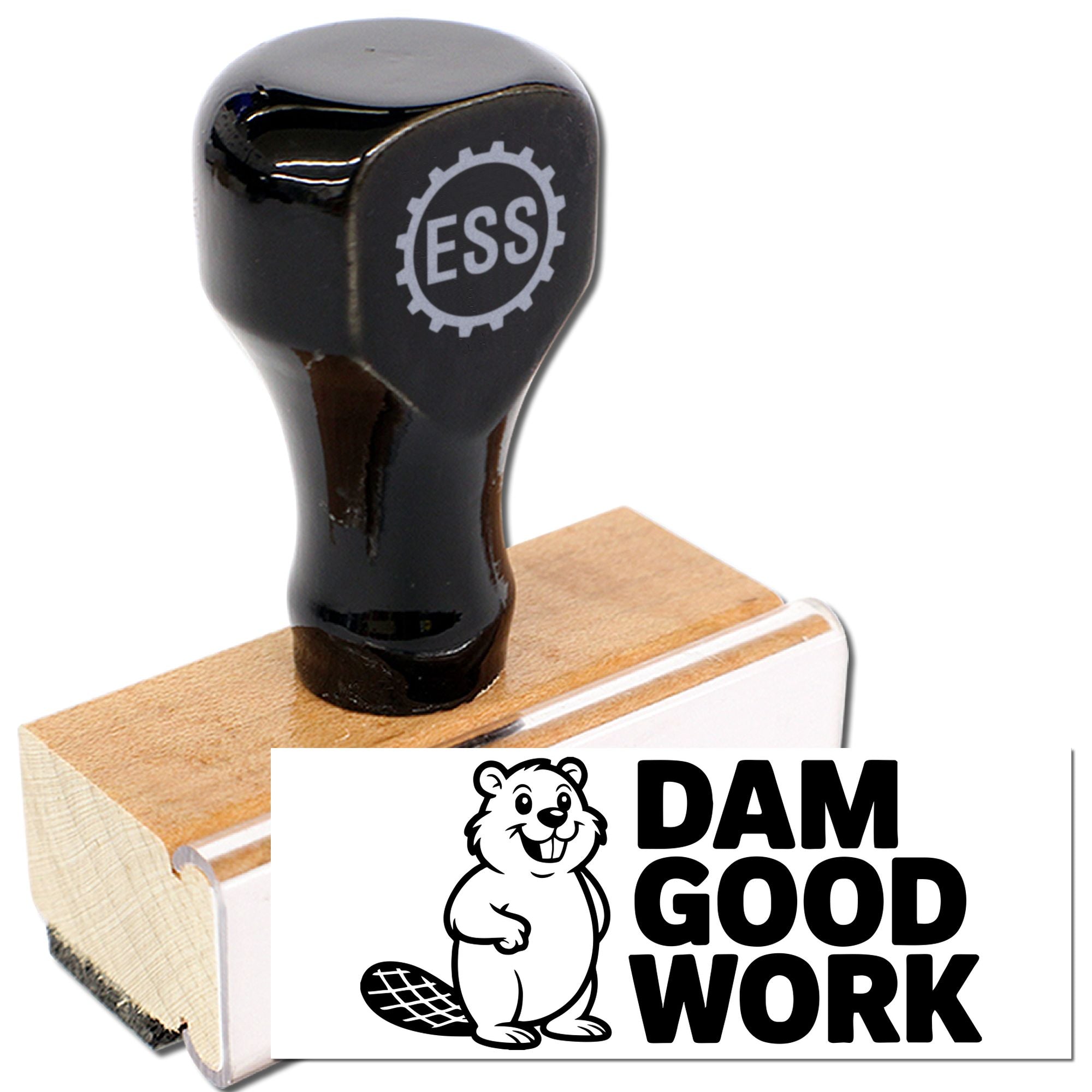 Black rubber stamp seal on wooden base with ESS gear logo, printing Dam Good Work and beaver graphic.
