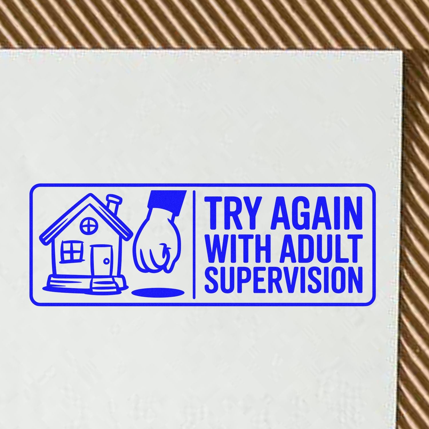 Blue rubber stamp seal with house and hand icon, reading Try Again With Adult Supervision, on white paper.