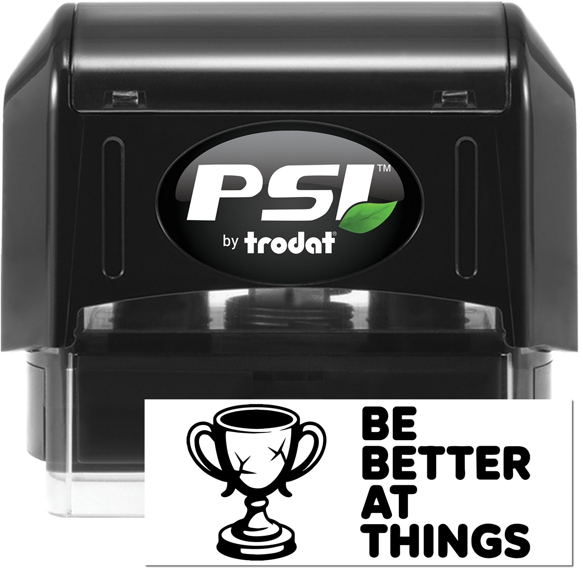 Black PSI by Trodat self-inking stamp with matching seal, featuring a green leaf logo and trophy Be Better at Things design.