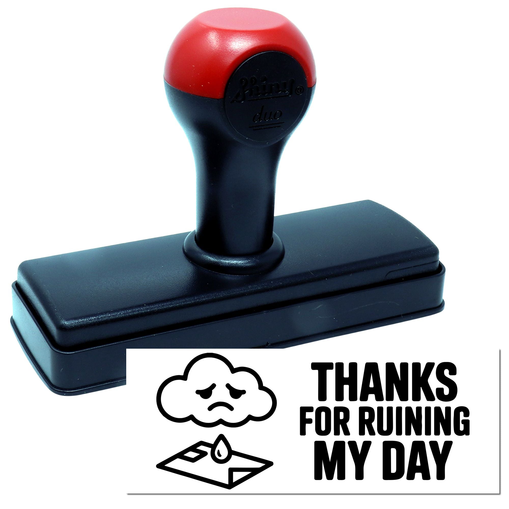 Red and black self-inking stamp and seal with Thanks for ruining my day design and sad cloud icon