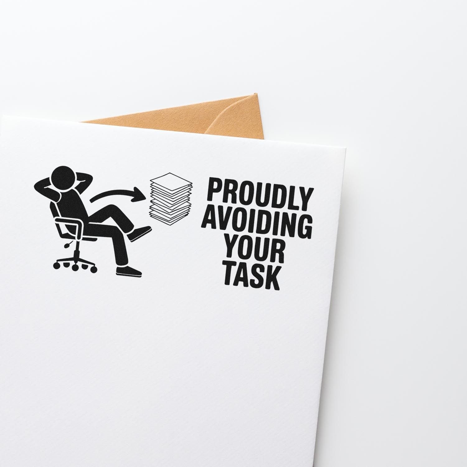 Black self-inking stamp and seal design on white card with tan envelope, showing relaxed figure and Proudly Avoiding Your Task???