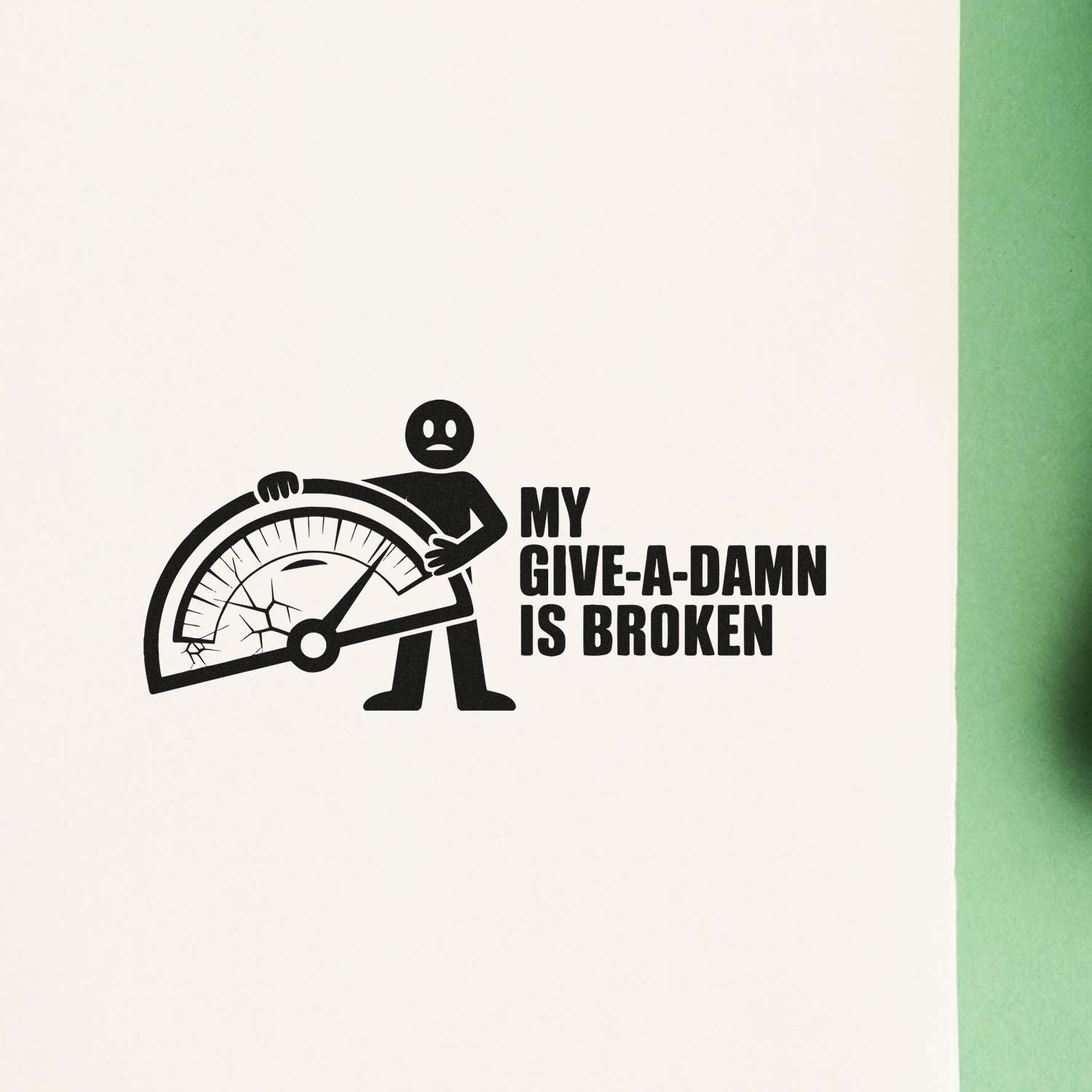 Black custom stamp seal with broken gauge graphic and bold text MY GIVE-A-DAMN IS BROKEN on white background.