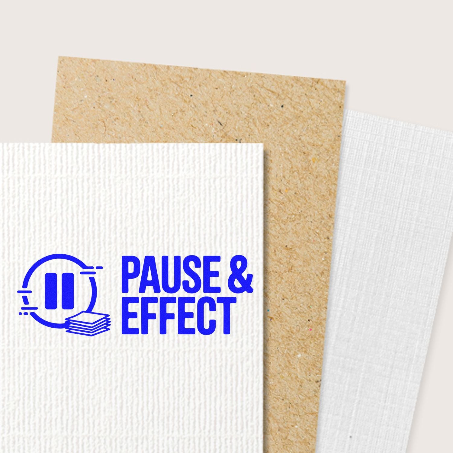 Blue Pause & Effect stamp on textured white and kraft seal paper samples, with layered cardstock textures.