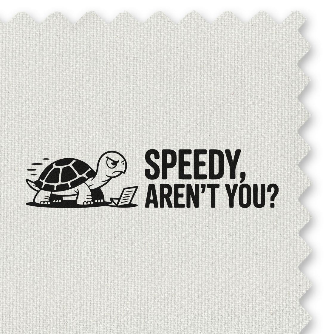 Black turtle rubber stamp reading Speedy, arent you? on a white textured fabric swatch with scalloped edge.