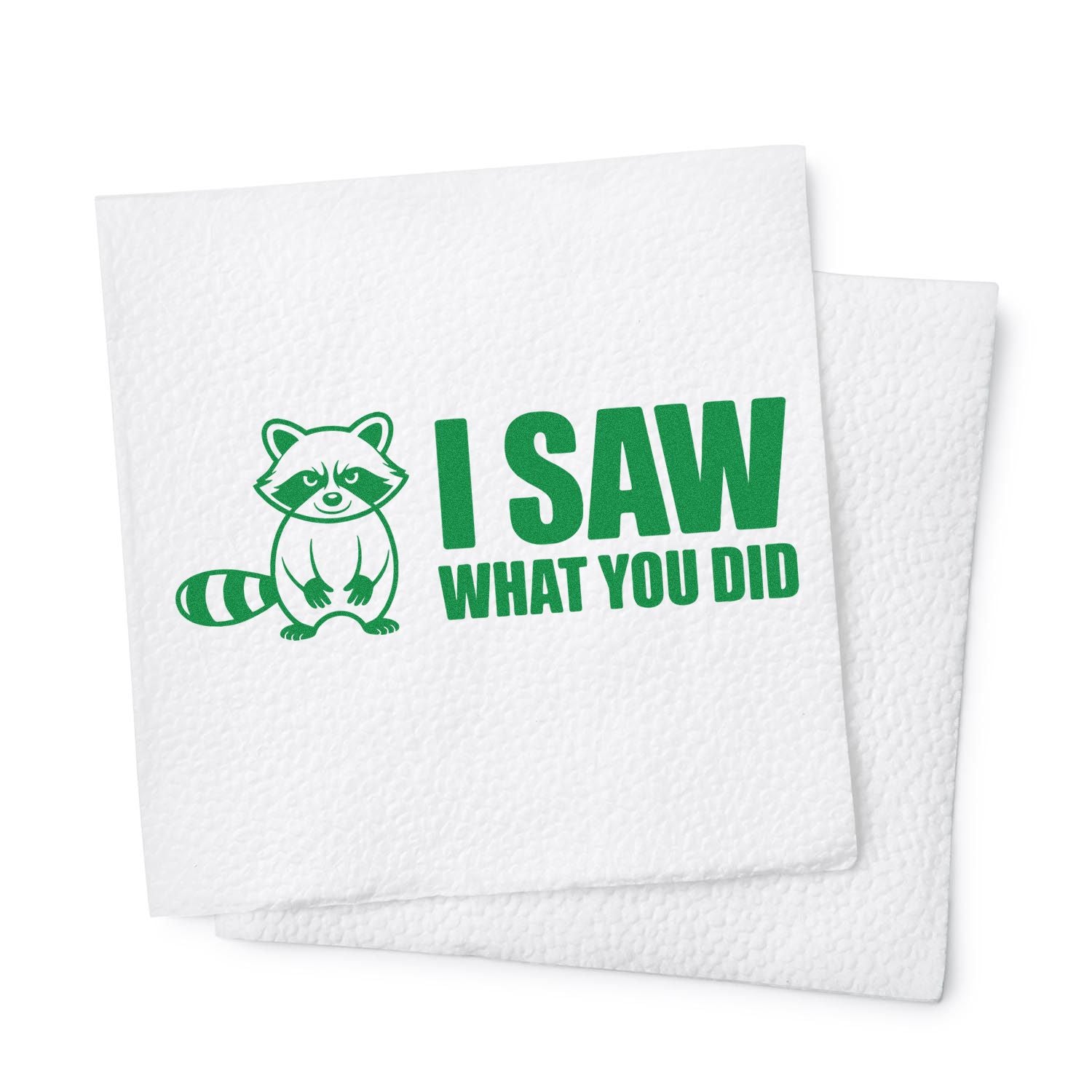 Green raccoon stamp seal on white textured napkins with I SAW WHAT YOU DID text.