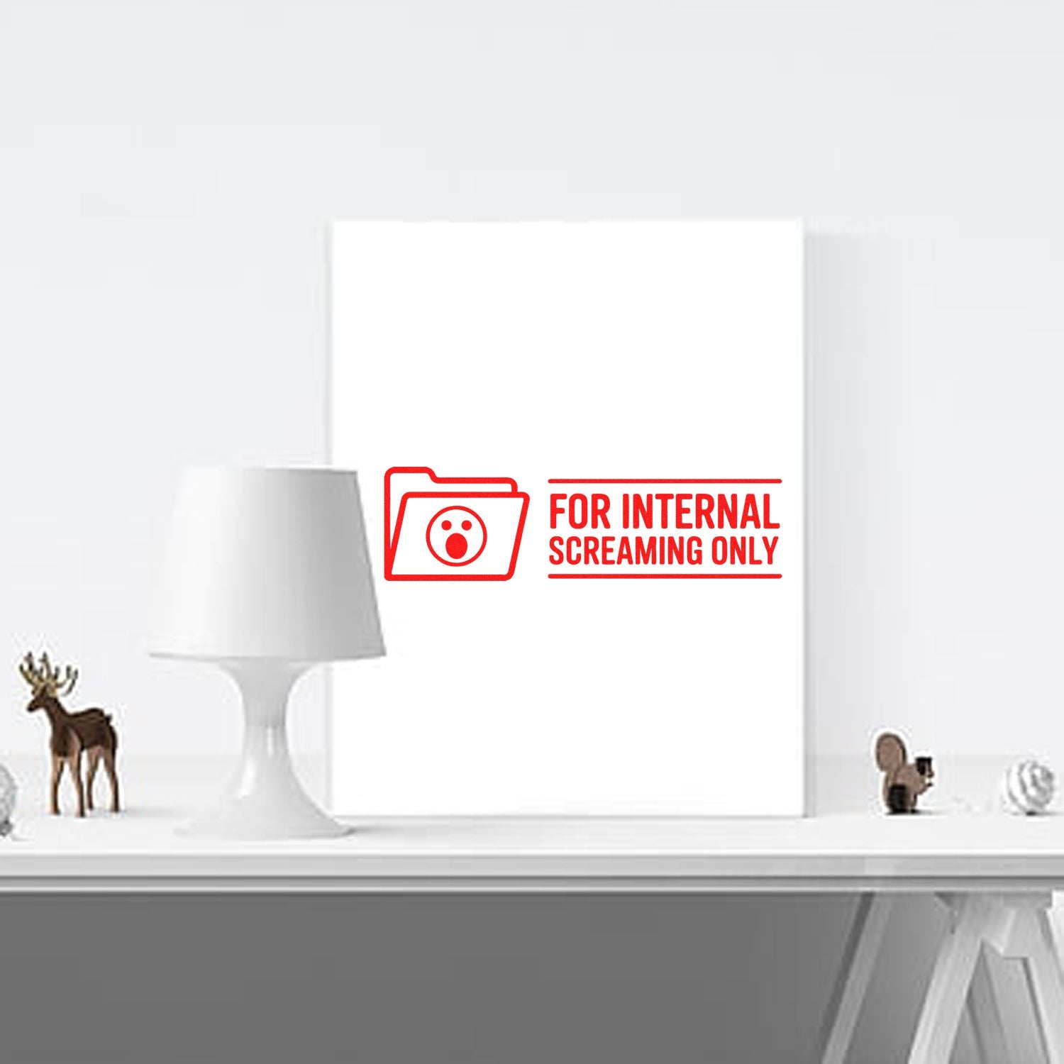 Red rubber stamp seal reading For Internal Screaming Only with folder icon on white office decor board.