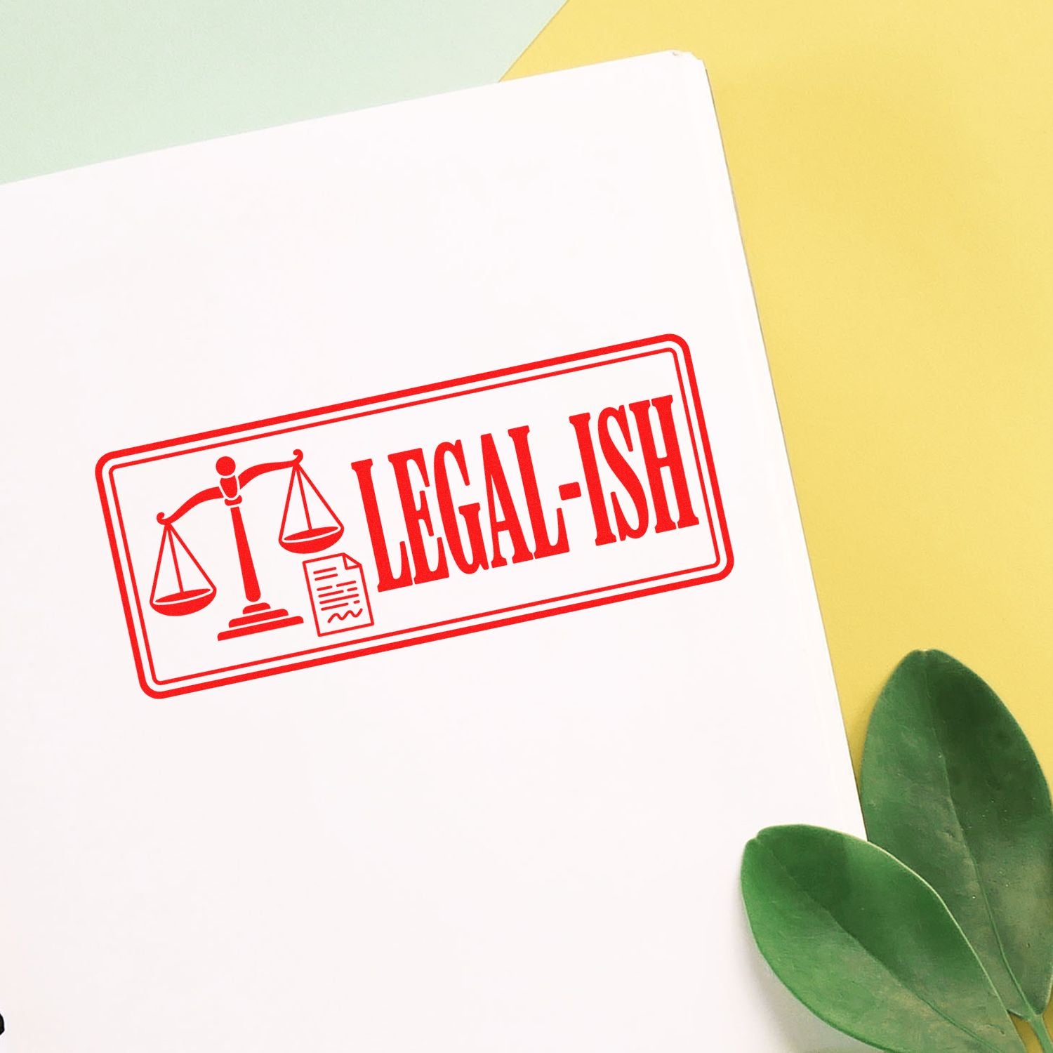 Red legal-ish stamp seal with scales and document icon on white paper against a yellow background with green leaves.