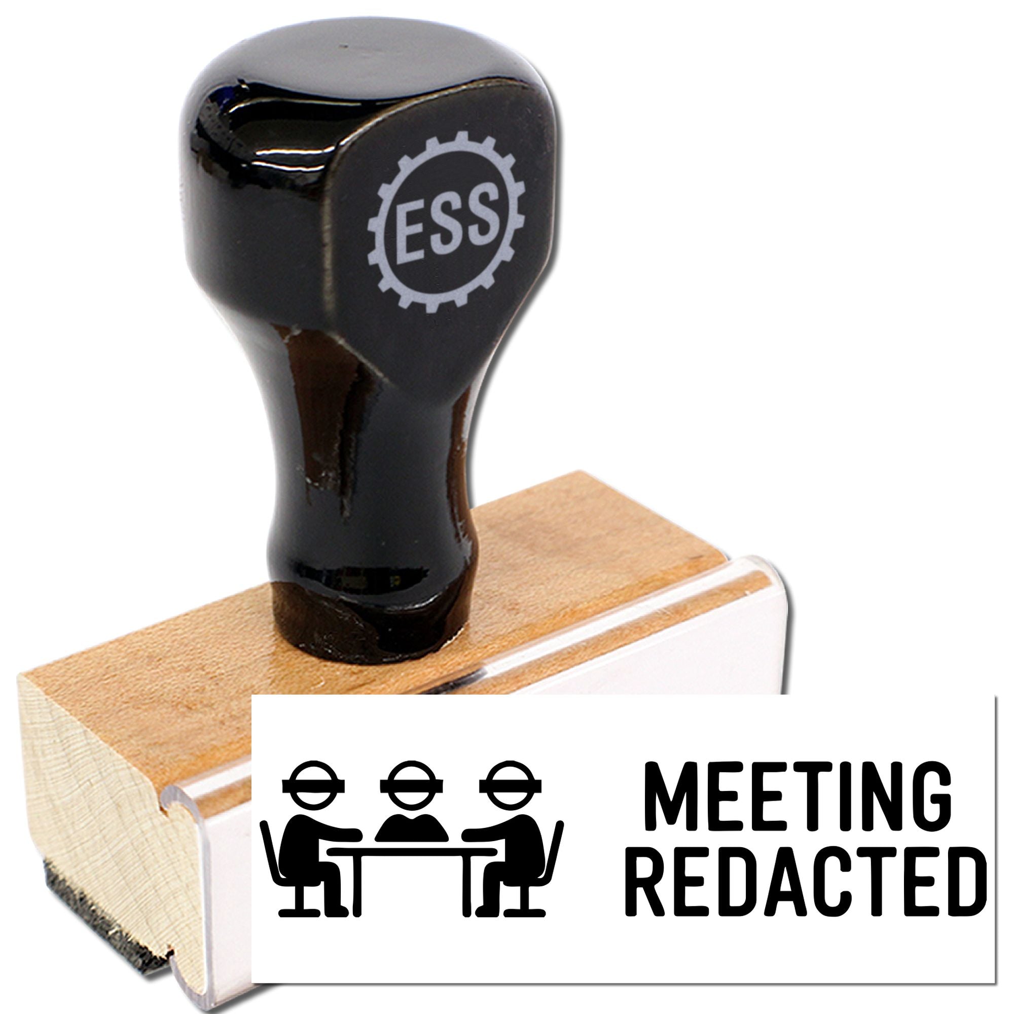 Black rubber office stamp on wooden block, with ESS logo and white seal card reading MEETING REDACTED.