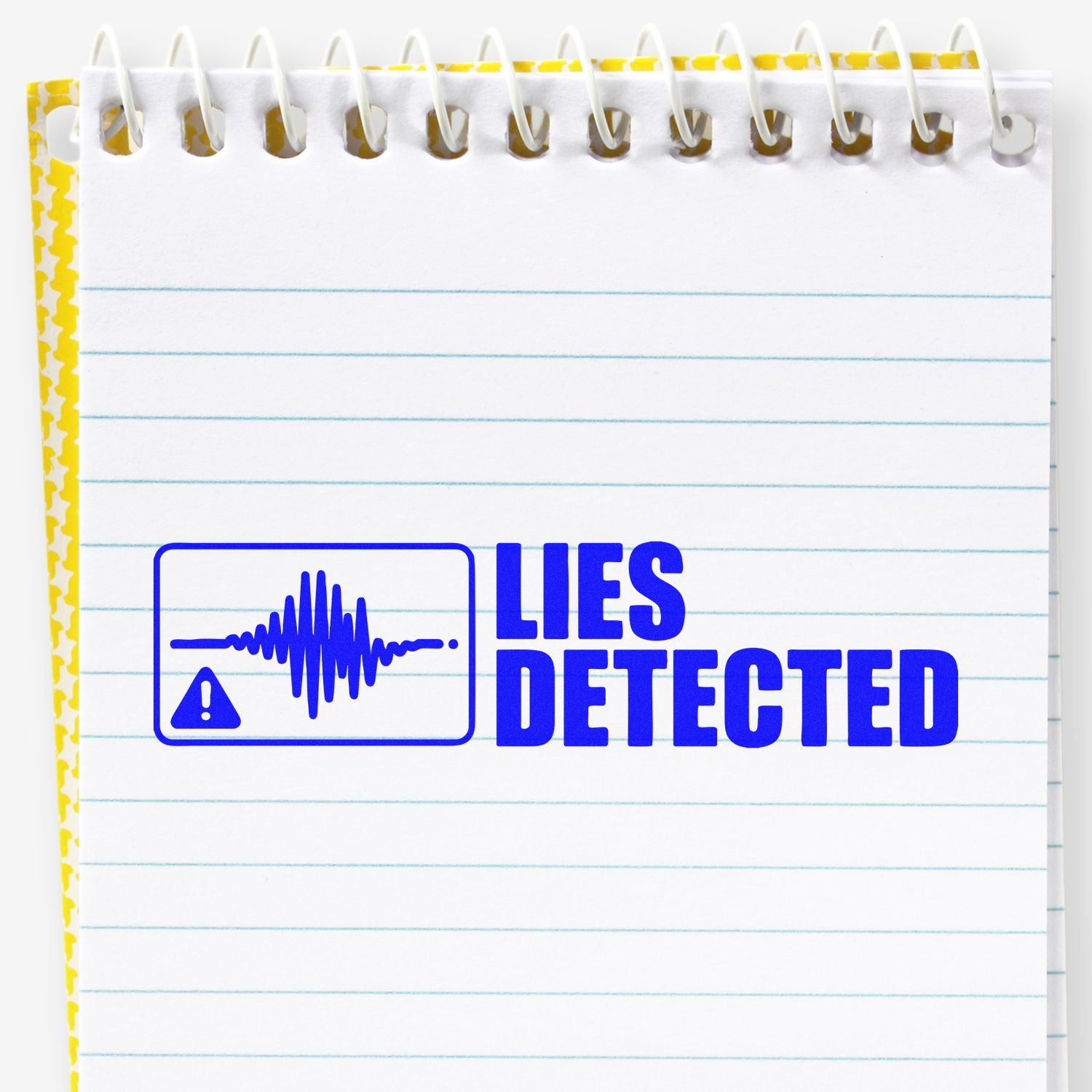 Blue LIES DETECTED stamp seal with warning icon on a white spiral notepad, accented by a yellow patterned border.
