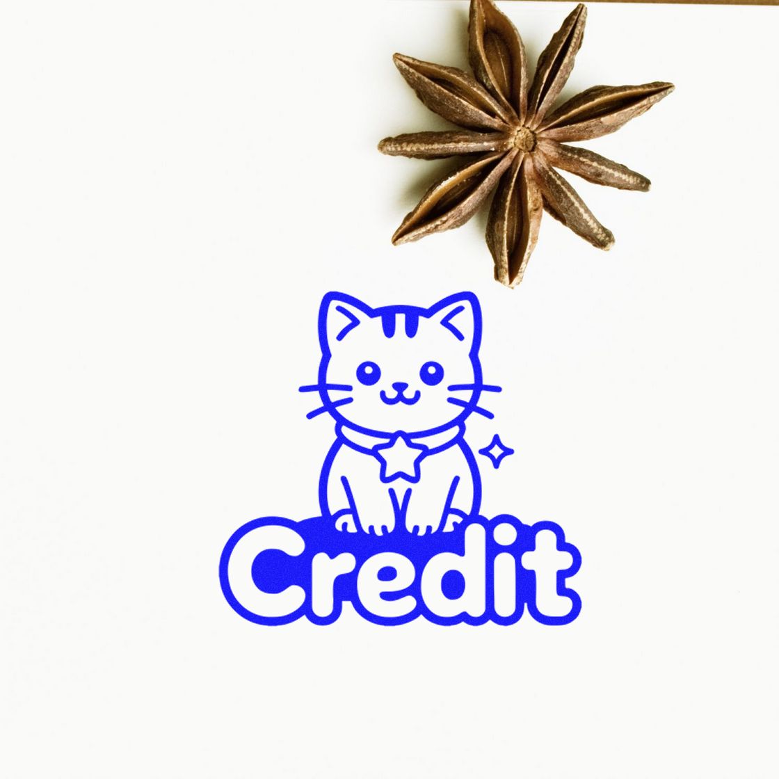 Blue cat Credit stamp with brown star anise seal on a white background.