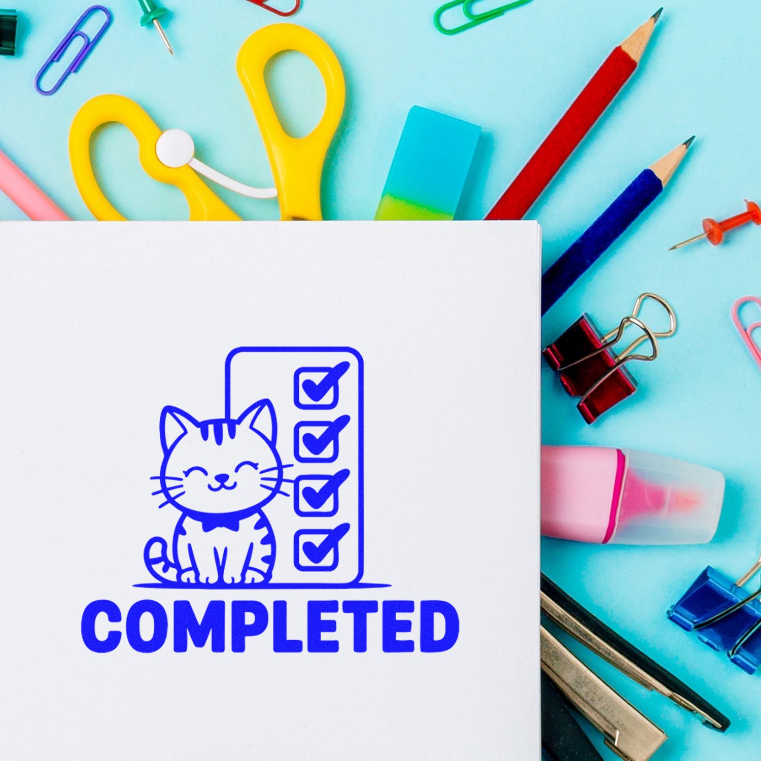 Blue completed stamp and seal with cat checklist on white card, surrounded by colorful stationery.