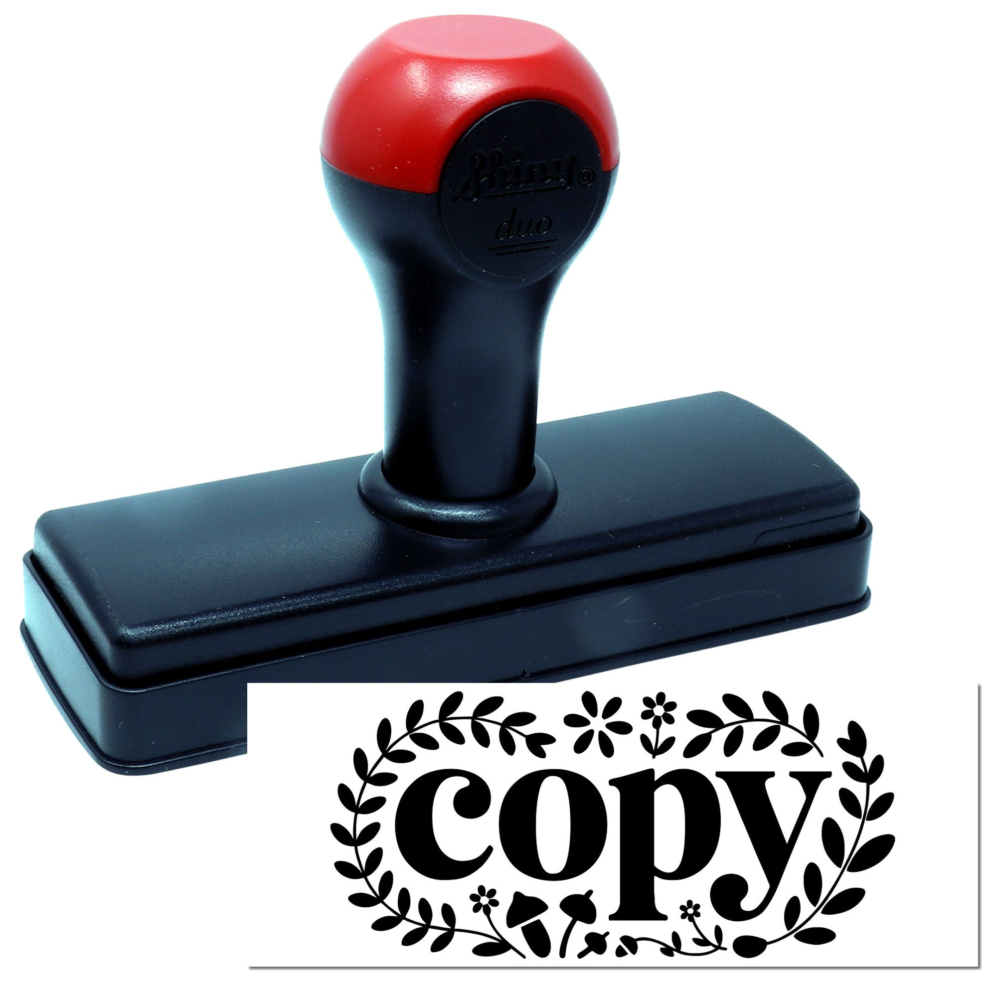 Red and black self-inking stamp with decorative leafy copy seal imprint